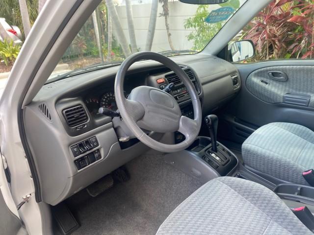 2001 Bright White /Gray Suzuki Vitara JLS LOW 35,130 1 OWNER (2S3TE52V716) with an 2.0L DOHC MPFI 16-Valve 4-Cyl Engine engine, Automatic transmission, located at 4701 North Dixie Hwy, Pompano Beach, FL, 33064, (954) 422-2889, 26.240938, -80.123474 - OUR WEBPAGE FLORIDACARS1.COM HAS OVER 100 PHOTOS AND FREE CARFAX LINK 2001 SUZUKI VITARA JLS VIN: 2S3TE52V716105780 2 S 3 T E 5 2 V 7 1 6 1 0 5 7 8 0 4 DOOR WAGON/SPORT UTILITY 2.0L I4 F DOHC 16V GASOLINE REAR WHEEL DRIVE Top Features Cloth Seats Soft Top Basic Features AM/FM Stereo Air Conditioning - Photo#36