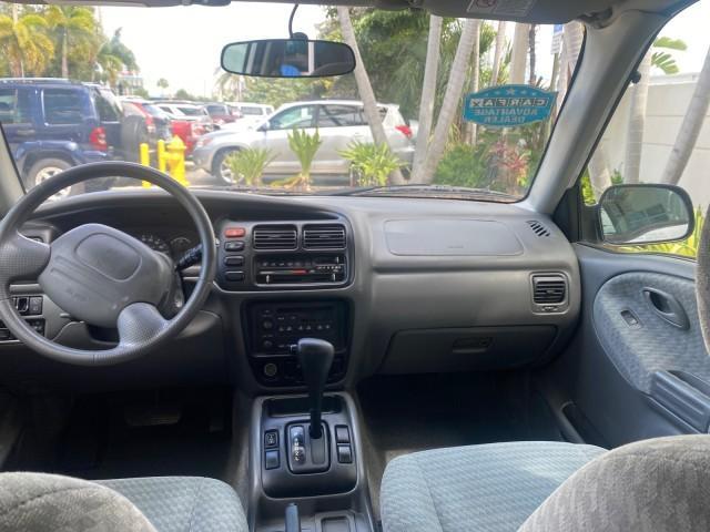 2001 Bright White /Gray Suzuki Vitara JLS LOW 35,130 1 OWNER (2S3TE52V716) with an 2.0L DOHC MPFI 16-Valve 4-Cyl Engine engine, Automatic transmission, located at 4701 North Dixie Hwy, Pompano Beach, FL, 33064, (954) 422-2889, 26.240938, -80.123474 - OUR WEBPAGE FLORIDACARS1.COM HAS OVER 100 PHOTOS AND FREE CARFAX LINK 2001 SUZUKI VITARA JLS VIN: 2S3TE52V716105780 2 S 3 T E 5 2 V 7 1 6 1 0 5 7 8 0 4 DOOR WAGON/SPORT UTILITY 2.0L I4 F DOHC 16V GASOLINE REAR WHEEL DRIVE Top Features Cloth Seats Soft Top Basic Features AM/FM Stereo Air Conditioning - Photo#66