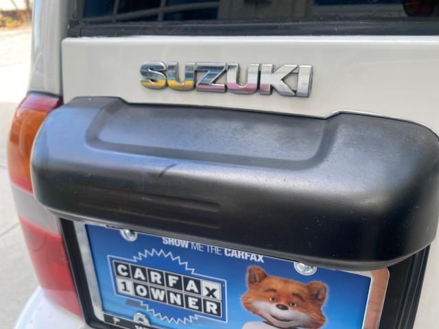 2001 Bright White /Gray Suzuki Vitara JLS LOW 35,130 1 OWNER (2S3TE52V716) with an 2.0L DOHC MPFI 16-Valve 4-Cyl Engine engine, Automatic transmission, located at 4701 North Dixie Hwy, Pompano Beach, FL, 33064, (954) 422-2889, 26.240938, -80.123474 - OUR WEBPAGE FLORIDACARS1.COM HAS OVER 100 PHOTOS AND FREE CARFAX LINK 2001 SUZUKI VITARA JLS VIN: 2S3TE52V716105780 2 S 3 T E 5 2 V 7 1 6 1 0 5 7 8 0 4 DOOR WAGON/SPORT UTILITY 2.0L I4 F DOHC 16V GASOLINE REAR WHEEL DRIVE Top Features Cloth Seats Soft Top Basic Features AM/FM Stereo Air Conditioning - Photo#74