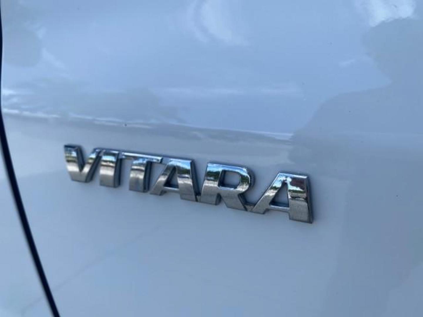 2001 Bright White /Gray Suzuki Vitara JLS LOW 35,130 1 OWNER (2S3TE52V716) with an 2.0L DOHC MPFI 16-Valve 4-Cyl Engine engine, Automatic transmission, located at 4701 North Dixie Hwy, Pompano Beach, FL, 33064, (954) 422-2889, 26.240938, -80.123474 - OUR WEBPAGE FLORIDACARS1.COM HAS OVER 100 PHOTOS AND FREE CARFAX LINK 2001 SUZUKI VITARA JLS VIN: 2S3TE52V716105780 2 S 3 T E 5 2 V 7 1 6 1 0 5 7 8 0 4 DOOR WAGON/SPORT UTILITY 2.0L I4 F DOHC 16V GASOLINE REAR WHEEL DRIVE Top Features Cloth Seats Soft Top Basic Features AM/FM Stereo Air Conditioning - Photo#90