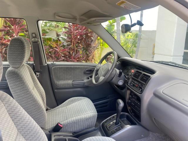 2001 Bright White /Gray Suzuki Vitara JLS LOW 35,130 1 OWNER (2S3TE52V716) with an 2.0L DOHC MPFI 16-Valve 4-Cyl Engine engine, Automatic transmission, located at 4701 North Dixie Hwy, Pompano Beach, FL, 33064, (954) 422-2889, 26.240938, -80.123474 - OUR WEBPAGE FLORIDACARS1.COM HAS OVER 100 PHOTOS AND FREE CARFAX LINK 2001 SUZUKI VITARA JLS VIN: 2S3TE52V716105780 2 S 3 T E 5 2 V 7 1 6 1 0 5 7 8 0 4 DOOR WAGON/SPORT UTILITY 2.0L I4 F DOHC 16V GASOLINE REAR WHEEL DRIVE Top Features Cloth Seats Soft Top Basic Features AM/FM Stereo Air Conditioning - Photo#95
