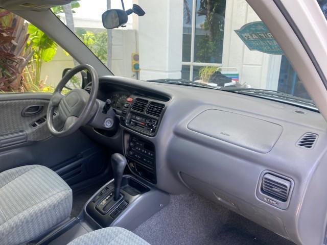 2001 Bright White /Gray Suzuki Vitara JLS LOW 35,130 1 OWNER (2S3TE52V716) with an 2.0L DOHC MPFI 16-Valve 4-Cyl Engine engine, Automatic transmission, located at 4701 North Dixie Hwy, Pompano Beach, FL, 33064, (954) 422-2889, 26.240938, -80.123474 - OUR WEBPAGE FLORIDACARS1.COM HAS OVER 100 PHOTOS AND FREE CARFAX LINK 2001 SUZUKI VITARA JLS VIN: 2S3TE52V716105780 2 S 3 T E 5 2 V 7 1 6 1 0 5 7 8 0 4 DOOR WAGON/SPORT UTILITY 2.0L I4 F DOHC 16V GASOLINE REAR WHEEL DRIVE Top Features Cloth Seats Soft Top Basic Features AM/FM Stereo Air Conditioning - Photo#97