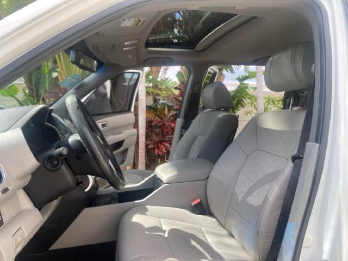 2011 Taffeta White /Gray Honda Pilot EX-L FL LOW MILES 93,295 (5FNYF3H58BB) with an 3.5L SOHC MPFI 24-Valve i-VTEC V6 Engine engine, Automatic transmission, located at 4701 North Dixie Hwy, Pompano Beach, FL, 33064, (954) 422-2889, 26.240938, -80.123474 - OUR WEBPAGE FLORIDACARS1.COM HAS OVER 100 PHOTOS AND FREE CARFAX LINK 2011 HONDA PILOT EX-L VIN: 5FNYF3H58BB048398 5 F N Y F 3 H 5 8 B B 0 4 8 3 9 8 4 DOOR WAGON/SPORT UTILITY 3.5L V6 F SOHC 24V GASOLINE FRONT WHEEL DRIVE Features ABS Brakes Air Conditioning Alloy Wheels AM/FM Stereo Automatic Trans - Photo#10