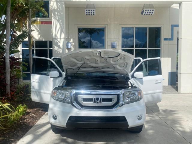 2011 Taffeta White /Gray Honda Pilot EX-L FL LOW MILES 93,512 (5FNYF3H58BB) with an 3.5L SOHC MPFI 24-Valve i-VTEC V6 Engine engine, Automatic transmission, located at 4701 North Dixie Hwy, Pompano Beach, FL, 33064, (954) 422-2889, 26.240938, -80.123474 - OUR WEBPAGE FLORIDACARS1.COM HAS OVER 100 PHOTOS AND FREE CARFAX LINK 2011 HONDA PILOT EX-L VIN: 5FNYF3H58BB048398 5 F N Y F 3 H 5 8 B B 0 4 8 3 9 8 4 DOOR WAGON/SPORT UTILITY 3.5L V6 F SOHC 24V GASOLINE FRONT WHEEL DRIVE Features ABS Brakes Air Conditioning Alloy Wheels AM/FM Stereo Automatic Trans - Photo#16