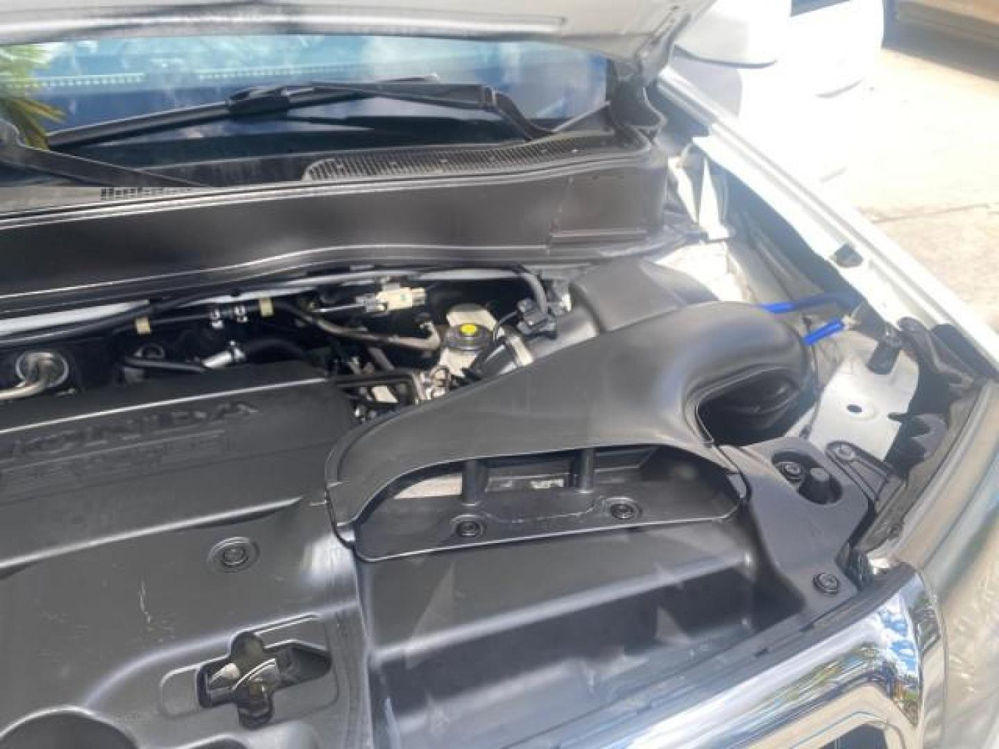 2011 Taffeta White /Gray Honda Pilot EX-L FL LOW MILES 93,295 (5FNYF3H58BB) with an 3.5L SOHC MPFI 24-Valve i-VTEC V6 Engine engine, Automatic transmission, located at 4701 North Dixie Hwy, Pompano Beach, FL, 33064, (954) 422-2889, 26.240938, -80.123474 - OUR WEBPAGE FLORIDACARS1.COM HAS OVER 100 PHOTOS AND FREE CARFAX LINK 2011 HONDA PILOT EX-L VIN: 5FNYF3H58BB048398 5 F N Y F 3 H 5 8 B B 0 4 8 3 9 8 4 DOOR WAGON/SPORT UTILITY 3.5L V6 F SOHC 24V GASOLINE FRONT WHEEL DRIVE Features ABS Brakes Air Conditioning Alloy Wheels AM/FM Stereo Automatic Trans - Photo#25