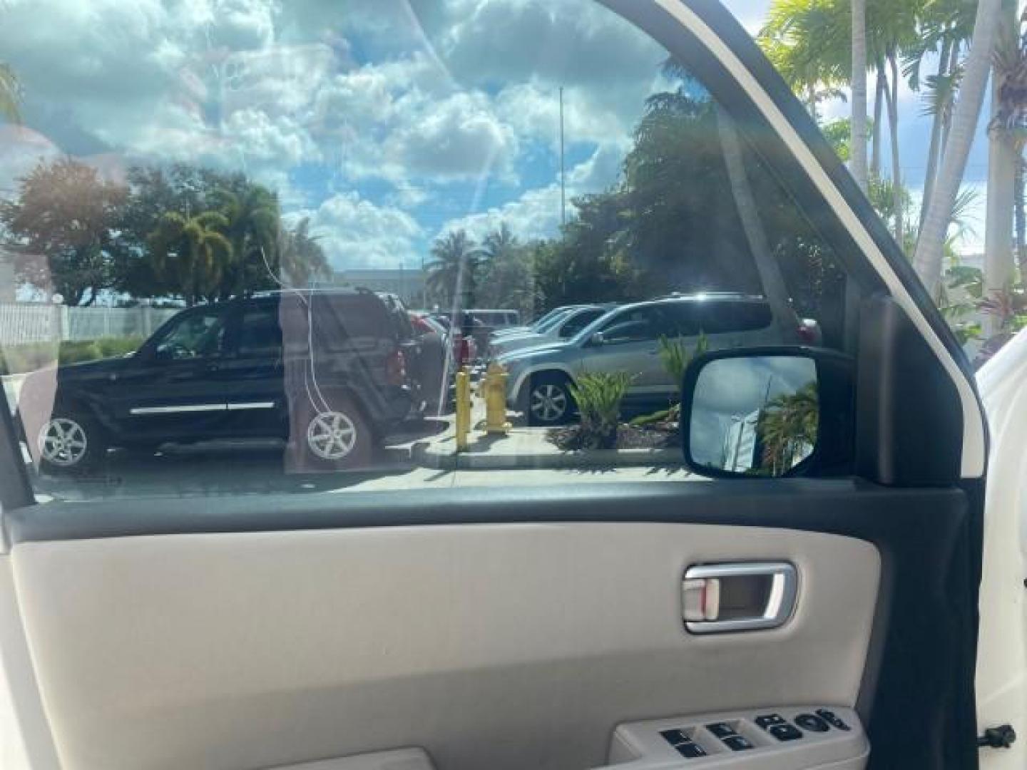 2011 Taffeta White /Gray Honda Pilot EX-L FL LOW MILES 93,295 (5FNYF3H58BB) with an 3.5L SOHC MPFI 24-Valve i-VTEC V6 Engine engine, Automatic transmission, located at 4701 North Dixie Hwy, Pompano Beach, FL, 33064, (954) 422-2889, 26.240938, -80.123474 - OUR WEBPAGE FLORIDACARS1.COM HAS OVER 100 PHOTOS AND FREE CARFAX LINK 2011 HONDA PILOT EX-L VIN: 5FNYF3H58BB048398 5 F N Y F 3 H 5 8 B B 0 4 8 3 9 8 4 DOOR WAGON/SPORT UTILITY 3.5L V6 F SOHC 24V GASOLINE FRONT WHEEL DRIVE Features ABS Brakes Air Conditioning Alloy Wheels AM/FM Stereo Automatic Trans - Photo#30