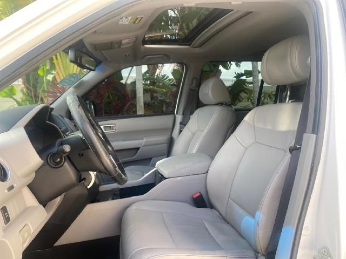 2011 Taffeta White /Gray Honda Pilot EX-L FL LOW MILES 93,295 (5FNYF3H58BB) with an 3.5L SOHC MPFI 24-Valve i-VTEC V6 Engine engine, Automatic transmission, located at 4701 North Dixie Hwy, Pompano Beach, FL, 33064, (954) 422-2889, 26.240938, -80.123474 - OUR WEBPAGE FLORIDACARS1.COM HAS OVER 100 PHOTOS AND FREE CARFAX LINK 2011 HONDA PILOT EX-L VIN: 5FNYF3H58BB048398 5 F N Y F 3 H 5 8 B B 0 4 8 3 9 8 4 DOOR WAGON/SPORT UTILITY 3.5L V6 F SOHC 24V GASOLINE FRONT WHEEL DRIVE Features ABS Brakes Air Conditioning Alloy Wheels AM/FM Stereo Automatic Trans - Photo#33