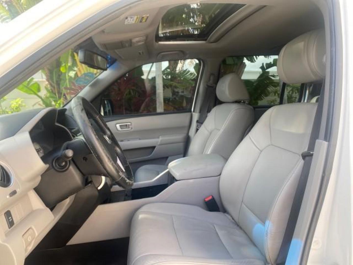 2011 Taffeta White /Gray Honda Pilot EX-L FL LOW MILES 93,295 (5FNYF3H58BB) with an 3.5L SOHC MPFI 24-Valve i-VTEC V6 Engine engine, Automatic transmission, located at 4701 North Dixie Hwy, Pompano Beach, FL, 33064, (954) 422-2889, 26.240938, -80.123474 - OUR WEBPAGE FLORIDACARS1.COM HAS OVER 100 PHOTOS AND FREE CARFAX LINK 2011 HONDA PILOT EX-L VIN: 5FNYF3H58BB048398 5 F N Y F 3 H 5 8 B B 0 4 8 3 9 8 4 DOOR WAGON/SPORT UTILITY 3.5L V6 F SOHC 24V GASOLINE FRONT WHEEL DRIVE Features ABS Brakes Air Conditioning Alloy Wheels AM/FM Stereo Automatic Trans - Photo#34