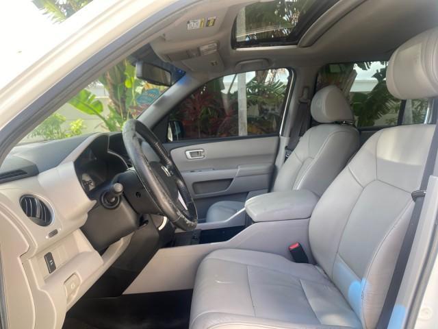 2011 Taffeta White /Gray Honda Pilot EX-L FL LOW MILES 93,512 (5FNYF3H58BB) with an 3.5L SOHC MPFI 24-Valve i-VTEC V6 Engine engine, Automatic transmission, located at 4701 North Dixie Hwy, Pompano Beach, FL, 33064, (954) 422-2889, 26.240938, -80.123474 - OUR WEBPAGE FLORIDACARS1.COM HAS OVER 100 PHOTOS AND FREE CARFAX LINK 2011 HONDA PILOT EX-L VIN: 5FNYF3H58BB048398 5 F N Y F 3 H 5 8 B B 0 4 8 3 9 8 4 DOOR WAGON/SPORT UTILITY 3.5L V6 F SOHC 24V GASOLINE FRONT WHEEL DRIVE Features ABS Brakes Air Conditioning Alloy Wheels AM/FM Stereo Automatic Trans - Photo#35