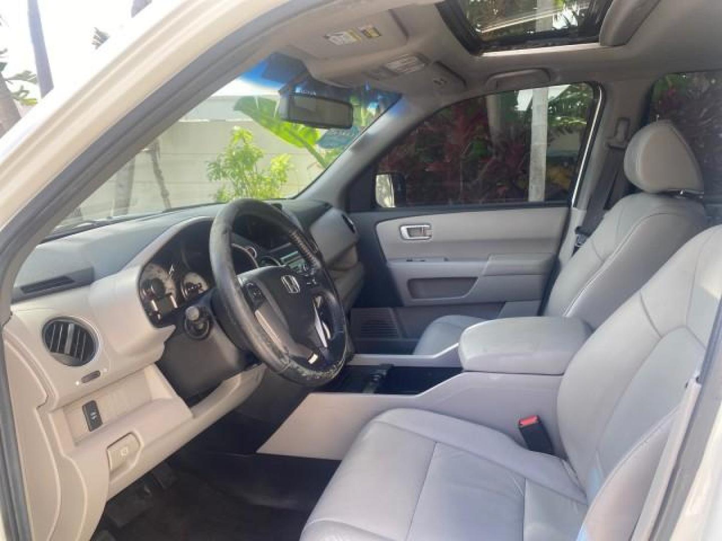 2011 Taffeta White /Gray Honda Pilot EX-L FL LOW MILES 93,295 (5FNYF3H58BB) with an 3.5L SOHC MPFI 24-Valve i-VTEC V6 Engine engine, Automatic transmission, located at 4701 North Dixie Hwy, Pompano Beach, FL, 33064, (954) 422-2889, 26.240938, -80.123474 - OUR WEBPAGE FLORIDACARS1.COM HAS OVER 100 PHOTOS AND FREE CARFAX LINK 2011 HONDA PILOT EX-L VIN: 5FNYF3H58BB048398 5 F N Y F 3 H 5 8 B B 0 4 8 3 9 8 4 DOOR WAGON/SPORT UTILITY 3.5L V6 F SOHC 24V GASOLINE FRONT WHEEL DRIVE Features ABS Brakes Air Conditioning Alloy Wheels AM/FM Stereo Automatic Trans - Photo#36