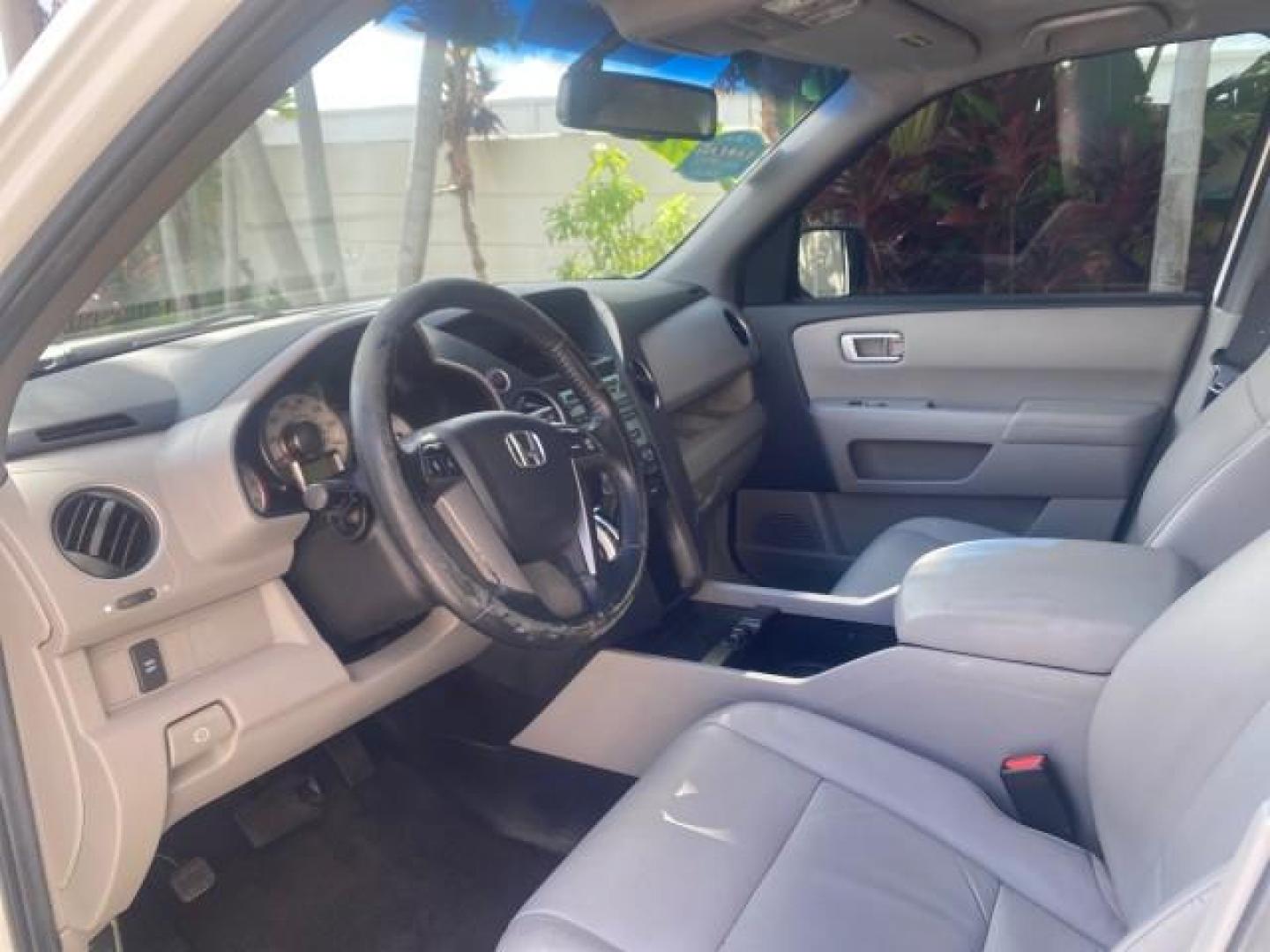 2011 Taffeta White /Gray Honda Pilot EX-L FL LOW MILES 93,295 (5FNYF3H58BB) with an 3.5L SOHC MPFI 24-Valve i-VTEC V6 Engine engine, Automatic transmission, located at 4701 North Dixie Hwy, Pompano Beach, FL, 33064, (954) 422-2889, 26.240938, -80.123474 - OUR WEBPAGE FLORIDACARS1.COM HAS OVER 100 PHOTOS AND FREE CARFAX LINK 2011 HONDA PILOT EX-L VIN: 5FNYF3H58BB048398 5 F N Y F 3 H 5 8 B B 0 4 8 3 9 8 4 DOOR WAGON/SPORT UTILITY 3.5L V6 F SOHC 24V GASOLINE FRONT WHEEL DRIVE Features ABS Brakes Air Conditioning Alloy Wheels AM/FM Stereo Automatic Trans - Photo#37
