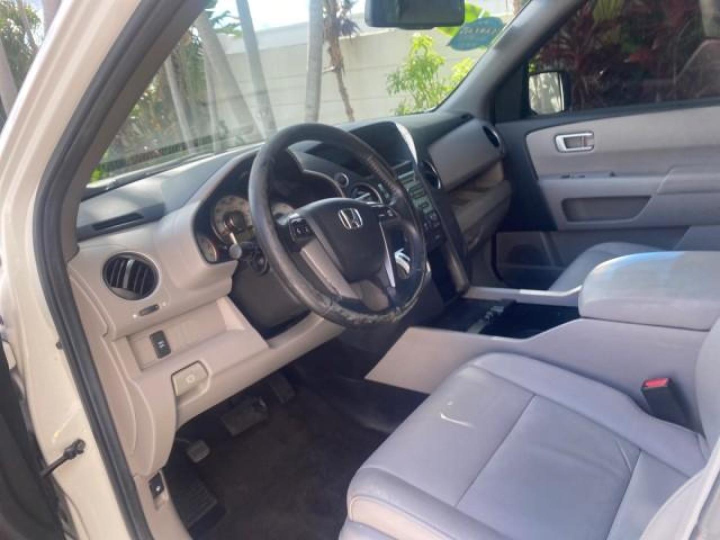 2011 Taffeta White /Gray Honda Pilot EX-L FL LOW MILES 93,295 (5FNYF3H58BB) with an 3.5L SOHC MPFI 24-Valve i-VTEC V6 Engine engine, Automatic transmission, located at 4701 North Dixie Hwy, Pompano Beach, FL, 33064, (954) 422-2889, 26.240938, -80.123474 - OUR WEBPAGE FLORIDACARS1.COM HAS OVER 100 PHOTOS AND FREE CARFAX LINK 2011 HONDA PILOT EX-L VIN: 5FNYF3H58BB048398 5 F N Y F 3 H 5 8 B B 0 4 8 3 9 8 4 DOOR WAGON/SPORT UTILITY 3.5L V6 F SOHC 24V GASOLINE FRONT WHEEL DRIVE Features ABS Brakes Air Conditioning Alloy Wheels AM/FM Stereo Automatic Trans - Photo#38