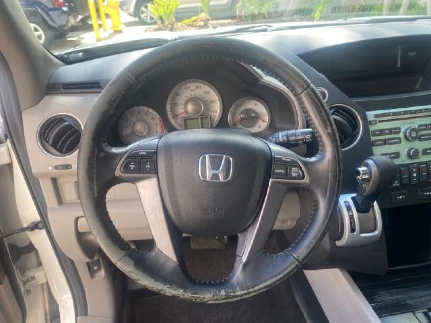 2011 Taffeta White /Gray Honda Pilot EX-L FL LOW MILES 93,295 (5FNYF3H58BB) with an 3.5L SOHC MPFI 24-Valve i-VTEC V6 Engine engine, Automatic transmission, located at 4701 North Dixie Hwy, Pompano Beach, FL, 33064, (954) 422-2889, 26.240938, -80.123474 - OUR WEBPAGE FLORIDACARS1.COM HAS OVER 100 PHOTOS AND FREE CARFAX LINK 2011 HONDA PILOT EX-L VIN: 5FNYF3H58BB048398 5 F N Y F 3 H 5 8 B B 0 4 8 3 9 8 4 DOOR WAGON/SPORT UTILITY 3.5L V6 F SOHC 24V GASOLINE FRONT WHEEL DRIVE Features ABS Brakes Air Conditioning Alloy Wheels AM/FM Stereo Automatic Trans - Photo#40