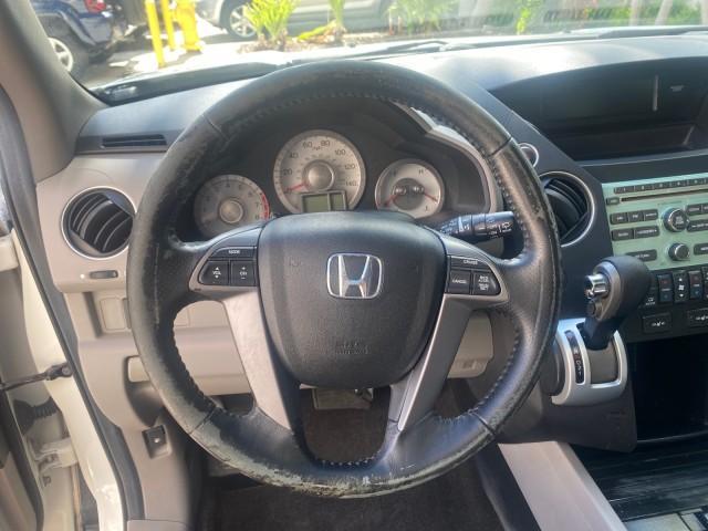 2011 Taffeta White /Gray Honda Pilot EX-L FL LOW MILES 93,512 (5FNYF3H58BB) with an 3.5L SOHC MPFI 24-Valve i-VTEC V6 Engine engine, Automatic transmission, located at 4701 North Dixie Hwy, Pompano Beach, FL, 33064, (954) 422-2889, 26.240938, -80.123474 - OUR WEBPAGE FLORIDACARS1.COM HAS OVER 100 PHOTOS AND FREE CARFAX LINK 2011 HONDA PILOT EX-L VIN: 5FNYF3H58BB048398 5 F N Y F 3 H 5 8 B B 0 4 8 3 9 8 4 DOOR WAGON/SPORT UTILITY 3.5L V6 F SOHC 24V GASOLINE FRONT WHEEL DRIVE Features ABS Brakes Air Conditioning Alloy Wheels AM/FM Stereo Automatic Trans - Photo#40