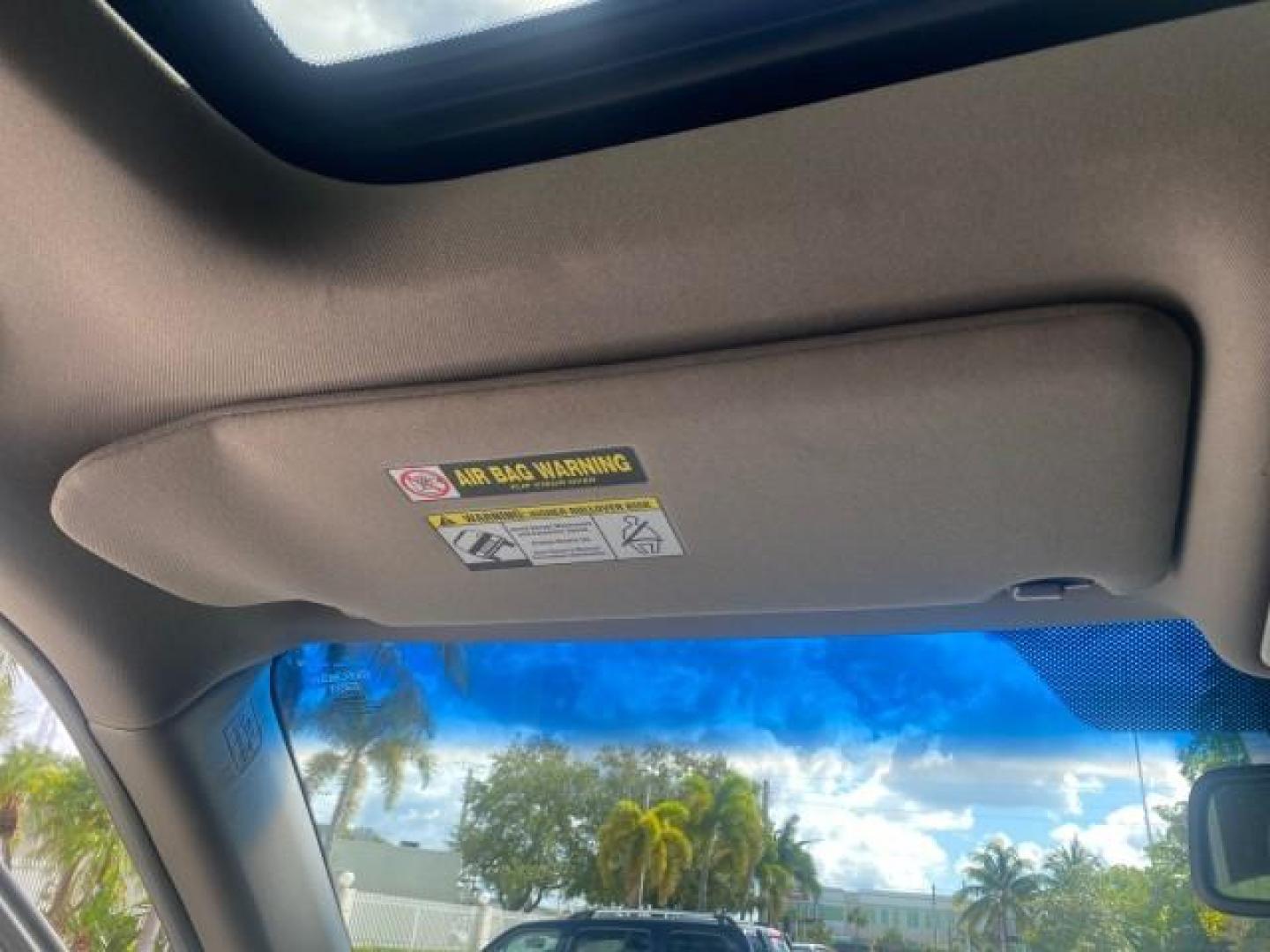 2011 Taffeta White /Gray Honda Pilot EX-L FL LOW MILES 93,295 (5FNYF3H58BB) with an 3.5L SOHC MPFI 24-Valve i-VTEC V6 Engine engine, Automatic transmission, located at 4701 North Dixie Hwy, Pompano Beach, FL, 33064, (954) 422-2889, 26.240938, -80.123474 - OUR WEBPAGE FLORIDACARS1.COM HAS OVER 100 PHOTOS AND FREE CARFAX LINK 2011 HONDA PILOT EX-L VIN: 5FNYF3H58BB048398 5 F N Y F 3 H 5 8 B B 0 4 8 3 9 8 4 DOOR WAGON/SPORT UTILITY 3.5L V6 F SOHC 24V GASOLINE FRONT WHEEL DRIVE Features ABS Brakes Air Conditioning Alloy Wheels AM/FM Stereo Automatic Trans - Photo#62