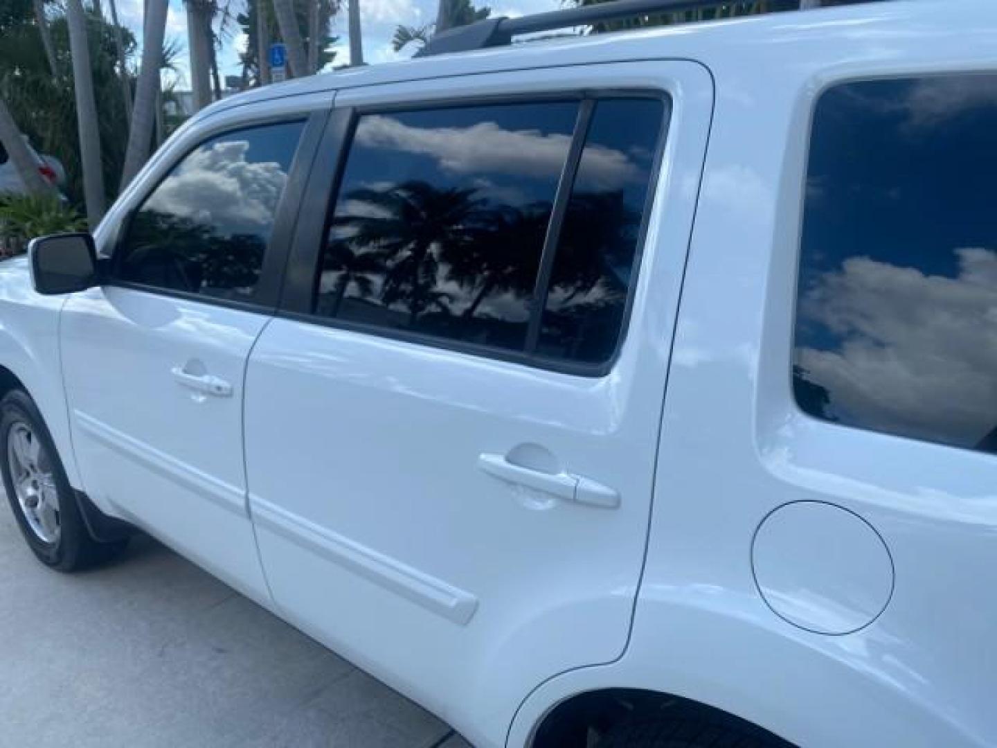 2011 Taffeta White /Gray Honda Pilot EX-L FL LOW MILES 93,295 (5FNYF3H58BB) with an 3.5L SOHC MPFI 24-Valve i-VTEC V6 Engine engine, Automatic transmission, located at 4701 North Dixie Hwy, Pompano Beach, FL, 33064, (954) 422-2889, 26.240938, -80.123474 - OUR WEBPAGE FLORIDACARS1.COM HAS OVER 100 PHOTOS AND FREE CARFAX LINK 2011 HONDA PILOT EX-L VIN: 5FNYF3H58BB048398 5 F N Y F 3 H 5 8 B B 0 4 8 3 9 8 4 DOOR WAGON/SPORT UTILITY 3.5L V6 F SOHC 24V GASOLINE FRONT WHEEL DRIVE Features ABS Brakes Air Conditioning Alloy Wheels AM/FM Stereo Automatic Trans - Photo#69
