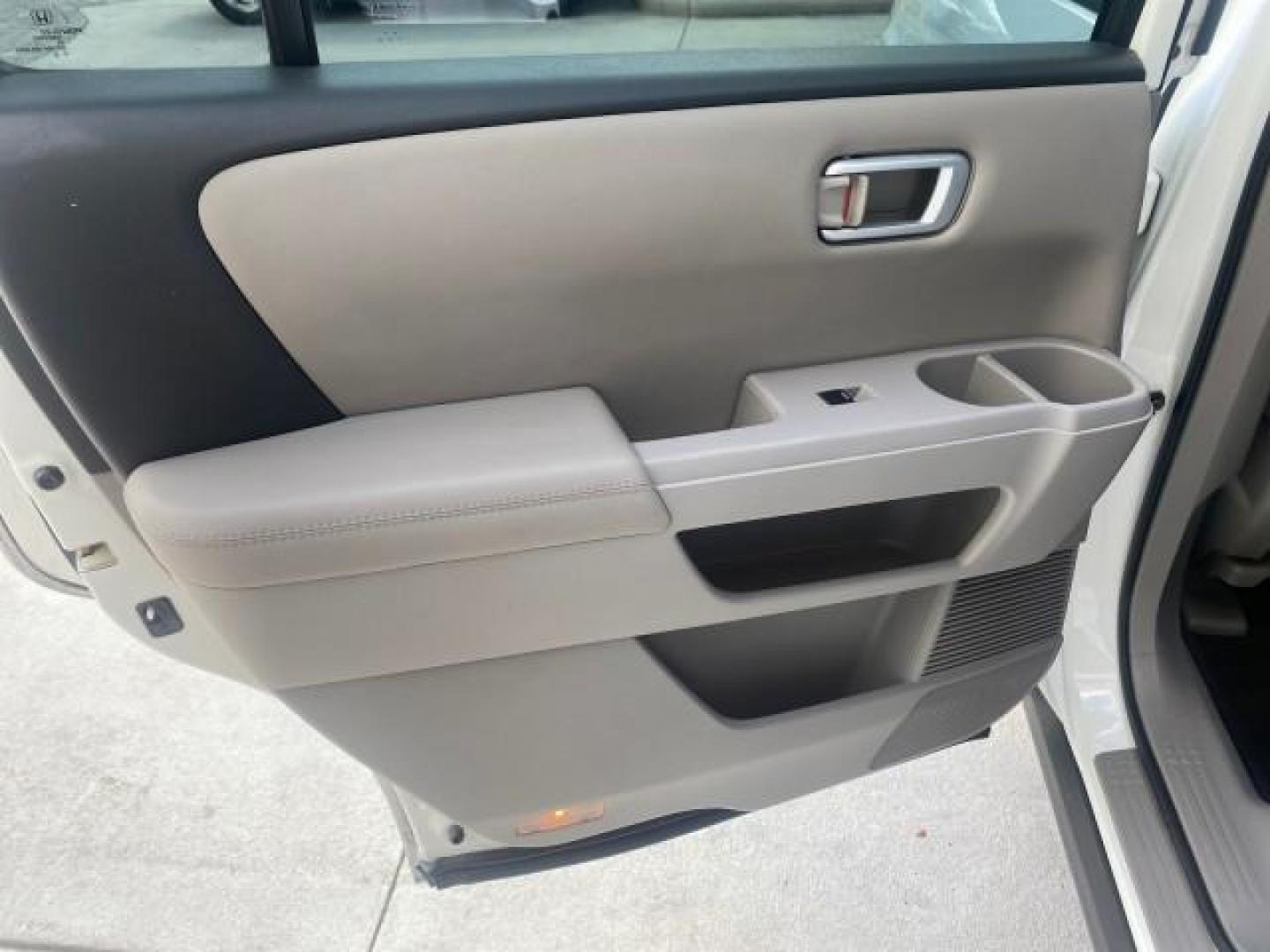 2011 Taffeta White /Gray Honda Pilot EX-L FL LOW MILES 93,295 (5FNYF3H58BB) with an 3.5L SOHC MPFI 24-Valve i-VTEC V6 Engine engine, Automatic transmission, located at 4701 North Dixie Hwy, Pompano Beach, FL, 33064, (954) 422-2889, 26.240938, -80.123474 - OUR WEBPAGE FLORIDACARS1.COM HAS OVER 100 PHOTOS AND FREE CARFAX LINK 2011 HONDA PILOT EX-L VIN: 5FNYF3H58BB048398 5 F N Y F 3 H 5 8 B B 0 4 8 3 9 8 4 DOOR WAGON/SPORT UTILITY 3.5L V6 F SOHC 24V GASOLINE FRONT WHEEL DRIVE Features ABS Brakes Air Conditioning Alloy Wheels AM/FM Stereo Automatic Trans - Photo#71
