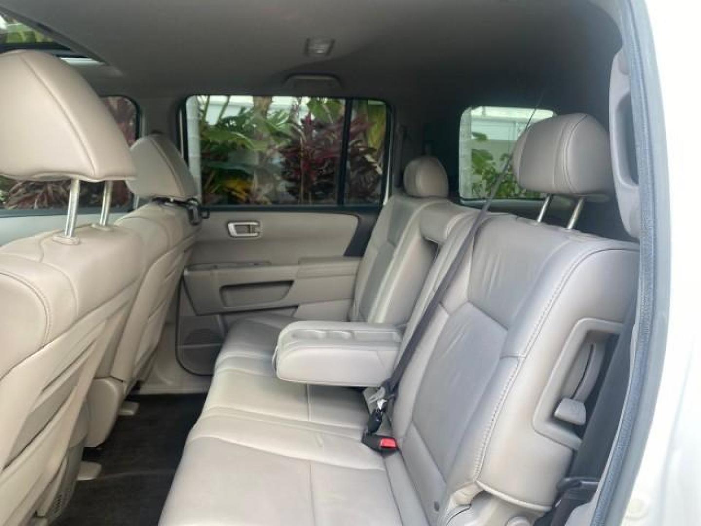 2011 Taffeta White /Gray Honda Pilot EX-L FL LOW MILES 93,295 (5FNYF3H58BB) with an 3.5L SOHC MPFI 24-Valve i-VTEC V6 Engine engine, Automatic transmission, located at 4701 North Dixie Hwy, Pompano Beach, FL, 33064, (954) 422-2889, 26.240938, -80.123474 - OUR WEBPAGE FLORIDACARS1.COM HAS OVER 100 PHOTOS AND FREE CARFAX LINK 2011 HONDA PILOT EX-L VIN: 5FNYF3H58BB048398 5 F N Y F 3 H 5 8 B B 0 4 8 3 9 8 4 DOOR WAGON/SPORT UTILITY 3.5L V6 F SOHC 24V GASOLINE FRONT WHEEL DRIVE Features ABS Brakes Air Conditioning Alloy Wheels AM/FM Stereo Automatic Trans - Photo#73