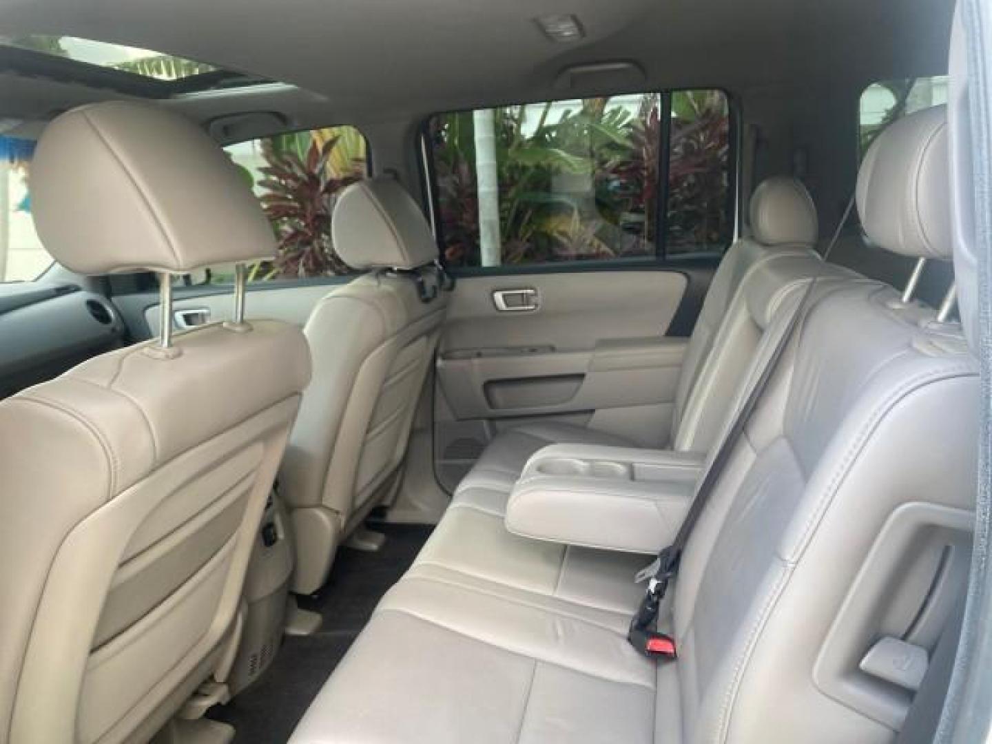 2011 Taffeta White /Gray Honda Pilot EX-L FL LOW MILES 93,295 (5FNYF3H58BB) with an 3.5L SOHC MPFI 24-Valve i-VTEC V6 Engine engine, Automatic transmission, located at 4701 North Dixie Hwy, Pompano Beach, FL, 33064, (954) 422-2889, 26.240938, -80.123474 - OUR WEBPAGE FLORIDACARS1.COM HAS OVER 100 PHOTOS AND FREE CARFAX LINK 2011 HONDA PILOT EX-L VIN: 5FNYF3H58BB048398 5 F N Y F 3 H 5 8 B B 0 4 8 3 9 8 4 DOOR WAGON/SPORT UTILITY 3.5L V6 F SOHC 24V GASOLINE FRONT WHEEL DRIVE Features ABS Brakes Air Conditioning Alloy Wheels AM/FM Stereo Automatic Trans - Photo#75