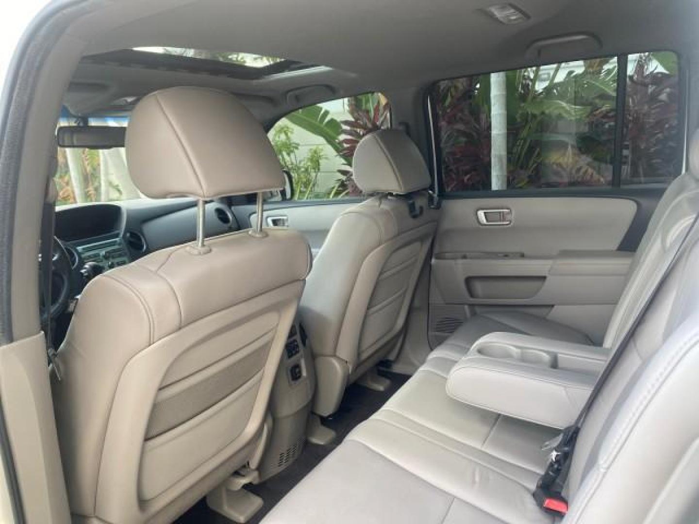 2011 Taffeta White /Gray Honda Pilot EX-L FL LOW MILES 93,295 (5FNYF3H58BB) with an 3.5L SOHC MPFI 24-Valve i-VTEC V6 Engine engine, Automatic transmission, located at 4701 North Dixie Hwy, Pompano Beach, FL, 33064, (954) 422-2889, 26.240938, -80.123474 - OUR WEBPAGE FLORIDACARS1.COM HAS OVER 100 PHOTOS AND FREE CARFAX LINK 2011 HONDA PILOT EX-L VIN: 5FNYF3H58BB048398 5 F N Y F 3 H 5 8 B B 0 4 8 3 9 8 4 DOOR WAGON/SPORT UTILITY 3.5L V6 F SOHC 24V GASOLINE FRONT WHEEL DRIVE Features ABS Brakes Air Conditioning Alloy Wheels AM/FM Stereo Automatic Trans - Photo#76