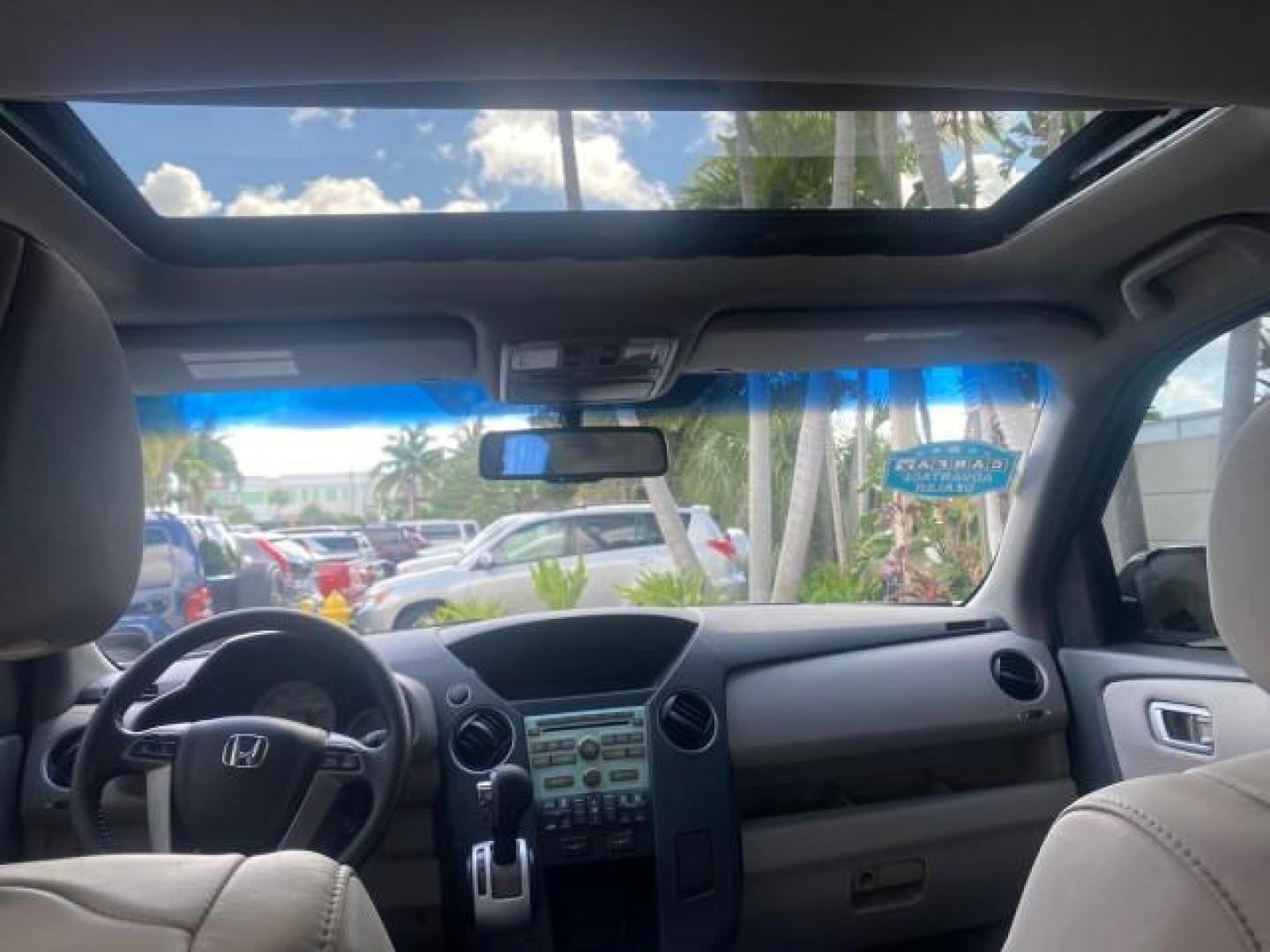 2011 Taffeta White /Gray Honda Pilot EX-L FL LOW MILES 93,295 (5FNYF3H58BB) with an 3.5L SOHC MPFI 24-Valve i-VTEC V6 Engine engine, Automatic transmission, located at 4701 North Dixie Hwy, Pompano Beach, FL, 33064, (954) 422-2889, 26.240938, -80.123474 - OUR WEBPAGE FLORIDACARS1.COM HAS OVER 100 PHOTOS AND FREE CARFAX LINK 2011 HONDA PILOT EX-L VIN: 5FNYF3H58BB048398 5 F N Y F 3 H 5 8 B B 0 4 8 3 9 8 4 DOOR WAGON/SPORT UTILITY 3.5L V6 F SOHC 24V GASOLINE FRONT WHEEL DRIVE Features ABS Brakes Air Conditioning Alloy Wheels AM/FM Stereo Automatic Trans - Photo#79