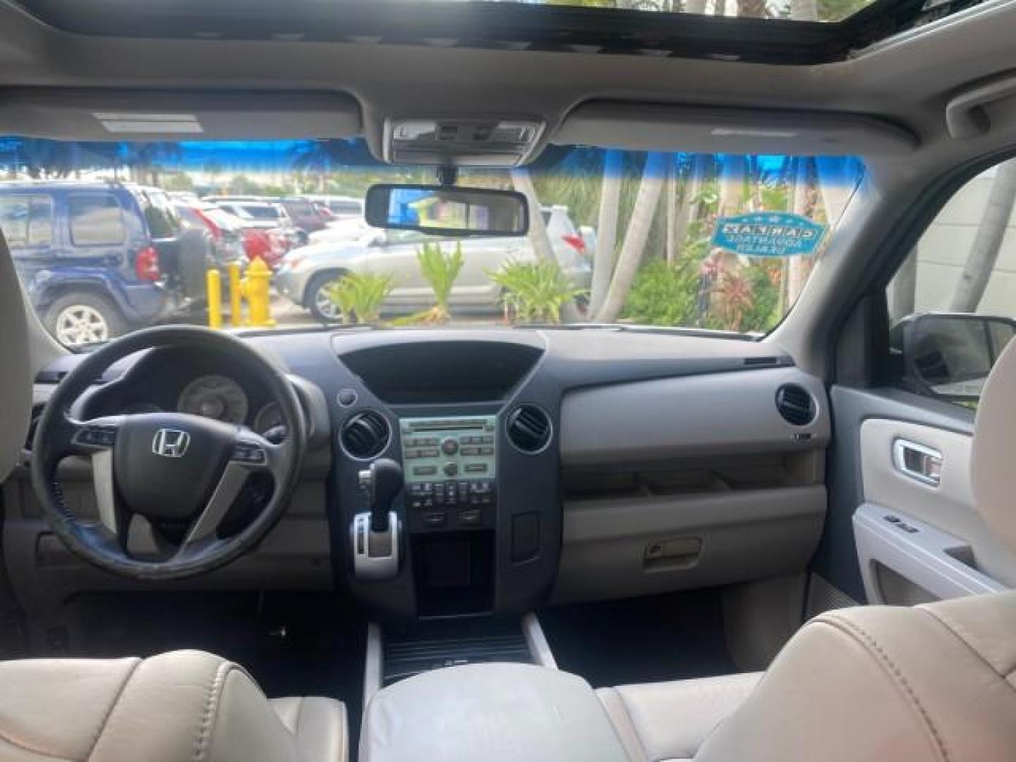 2011 Taffeta White /Gray Honda Pilot EX-L FL LOW MILES 93,295 (5FNYF3H58BB) with an 3.5L SOHC MPFI 24-Valve i-VTEC V6 Engine engine, Automatic transmission, located at 4701 North Dixie Hwy, Pompano Beach, FL, 33064, (954) 422-2889, 26.240938, -80.123474 - OUR WEBPAGE FLORIDACARS1.COM HAS OVER 100 PHOTOS AND FREE CARFAX LINK 2011 HONDA PILOT EX-L VIN: 5FNYF3H58BB048398 5 F N Y F 3 H 5 8 B B 0 4 8 3 9 8 4 DOOR WAGON/SPORT UTILITY 3.5L V6 F SOHC 24V GASOLINE FRONT WHEEL DRIVE Features ABS Brakes Air Conditioning Alloy Wheels AM/FM Stereo Automatic Trans - Photo#80