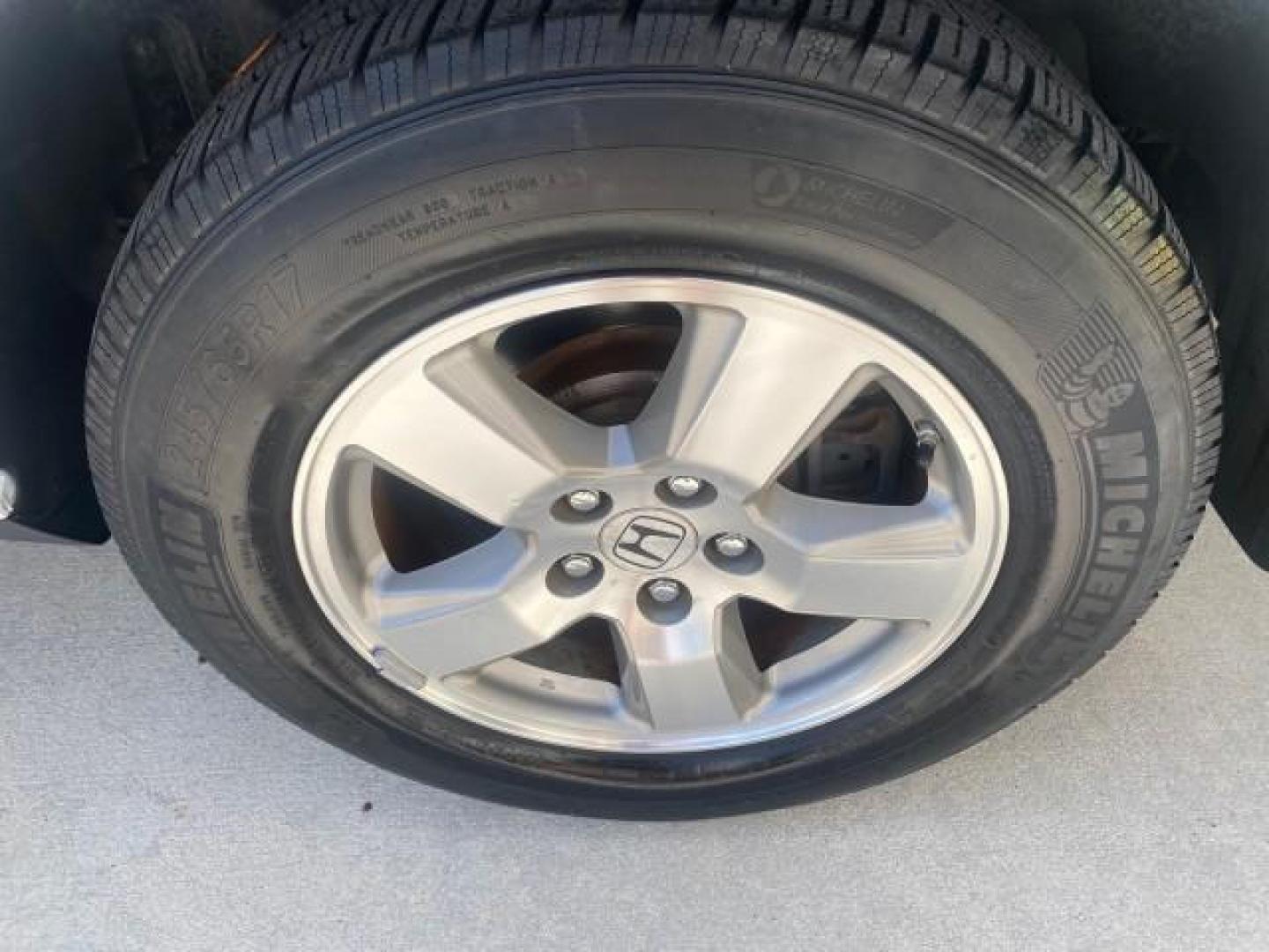 2011 Taffeta White /Gray Honda Pilot EX-L FL LOW MILES 93,295 (5FNYF3H58BB) with an 3.5L SOHC MPFI 24-Valve i-VTEC V6 Engine engine, Automatic transmission, located at 4701 North Dixie Hwy, Pompano Beach, FL, 33064, (954) 422-2889, 26.240938, -80.123474 - OUR WEBPAGE FLORIDACARS1.COM HAS OVER 100 PHOTOS AND FREE CARFAX LINK 2011 HONDA PILOT EX-L VIN: 5FNYF3H58BB048398 5 F N Y F 3 H 5 8 B B 0 4 8 3 9 8 4 DOOR WAGON/SPORT UTILITY 3.5L V6 F SOHC 24V GASOLINE FRONT WHEEL DRIVE Features ABS Brakes Air Conditioning Alloy Wheels AM/FM Stereo Automatic Trans - Photo#82
