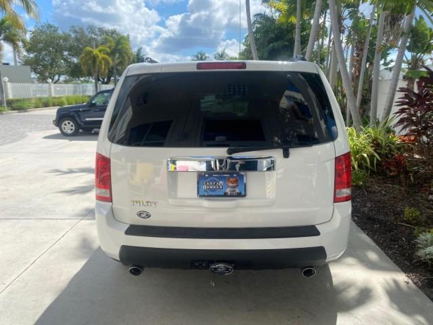 2011 Taffeta White /Gray Honda Pilot EX-L FL LOW MILES 93,295 (5FNYF3H58BB) with an 3.5L SOHC MPFI 24-Valve i-VTEC V6 Engine engine, Automatic transmission, located at 4701 North Dixie Hwy, Pompano Beach, FL, 33064, (954) 422-2889, 26.240938, -80.123474 - OUR WEBPAGE FLORIDACARS1.COM HAS OVER 100 PHOTOS AND FREE CARFAX LINK 2011 HONDA PILOT EX-L VIN: 5FNYF3H58BB048398 5 F N Y F 3 H 5 8 B B 0 4 8 3 9 8 4 DOOR WAGON/SPORT UTILITY 3.5L V6 F SOHC 24V GASOLINE FRONT WHEEL DRIVE Features ABS Brakes Air Conditioning Alloy Wheels AM/FM Stereo Automatic Trans - Photo#87