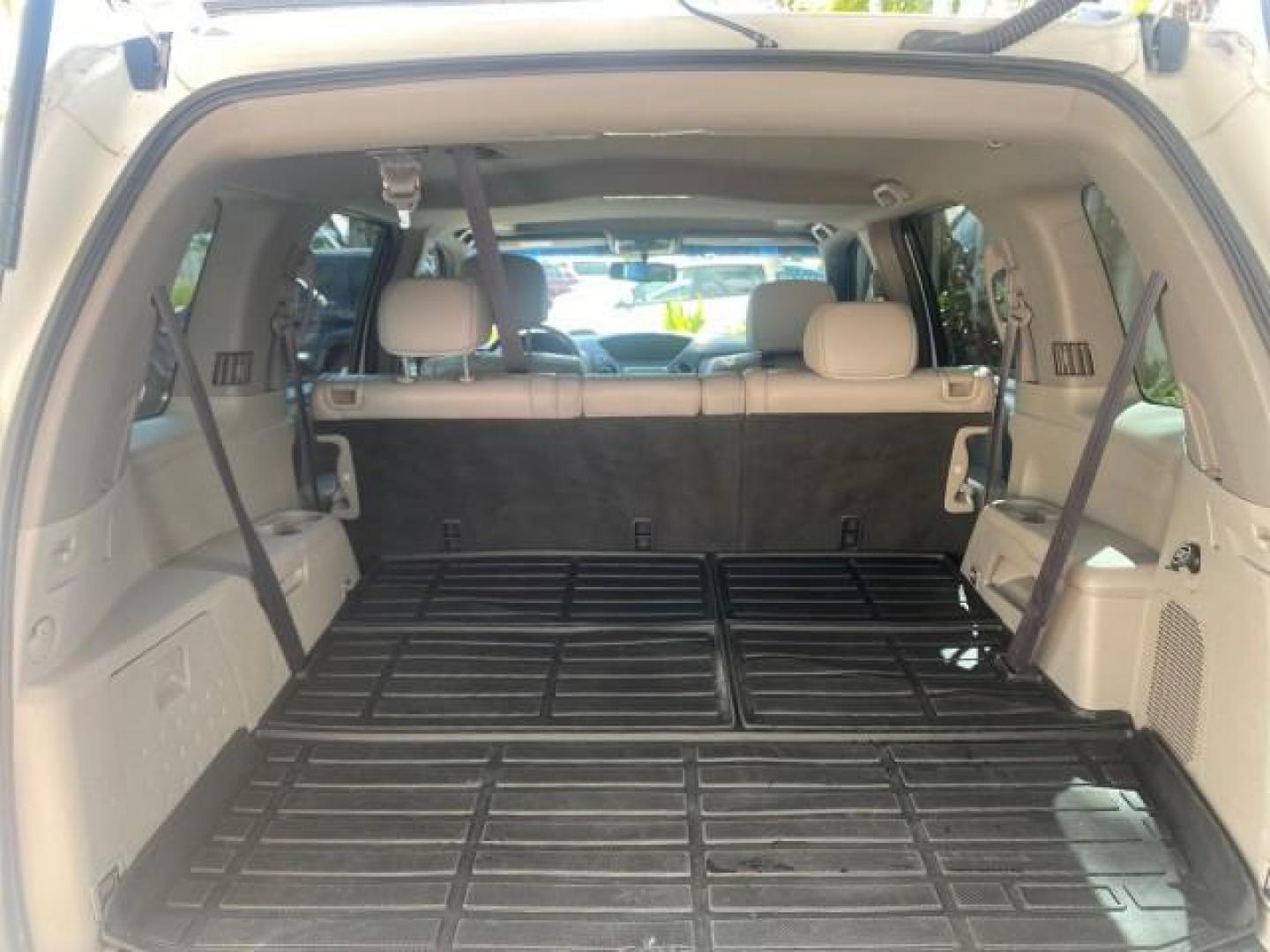 2011 Taffeta White /Gray Honda Pilot EX-L FL LOW MILES 93,295 (5FNYF3H58BB) with an 3.5L SOHC MPFI 24-Valve i-VTEC V6 Engine engine, Automatic transmission, located at 4701 North Dixie Hwy, Pompano Beach, FL, 33064, (954) 422-2889, 26.240938, -80.123474 - OUR WEBPAGE FLORIDACARS1.COM HAS OVER 100 PHOTOS AND FREE CARFAX LINK 2011 HONDA PILOT EX-L VIN: 5FNYF3H58BB048398 5 F N Y F 3 H 5 8 B B 0 4 8 3 9 8 4 DOOR WAGON/SPORT UTILITY 3.5L V6 F SOHC 24V GASOLINE FRONT WHEEL DRIVE Features ABS Brakes Air Conditioning Alloy Wheels AM/FM Stereo Automatic Trans - Photo#95