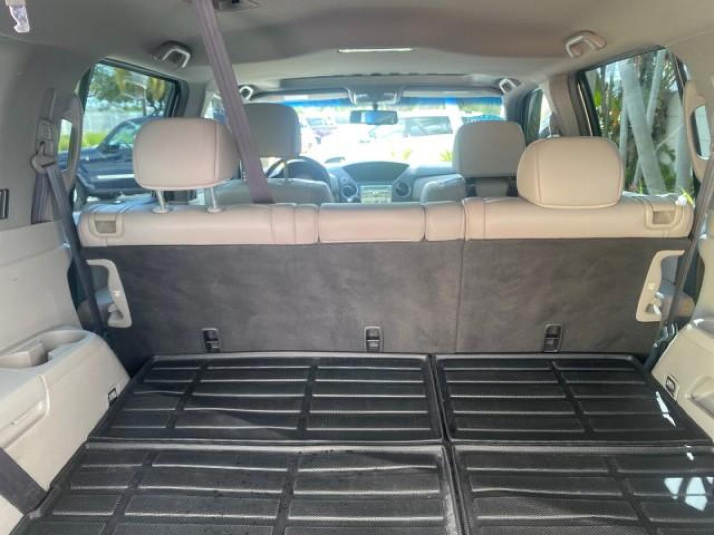 2011 Taffeta White /Gray Honda Pilot EX-L FL LOW MILES 93,295 (5FNYF3H58BB) with an 3.5L SOHC MPFI 24-Valve i-VTEC V6 Engine engine, Automatic transmission, located at 4701 North Dixie Hwy, Pompano Beach, FL, 33064, (954) 422-2889, 26.240938, -80.123474 - OUR WEBPAGE FLORIDACARS1.COM HAS OVER 100 PHOTOS AND FREE CARFAX LINK 2011 HONDA PILOT EX-L VIN: 5FNYF3H58BB048398 5 F N Y F 3 H 5 8 B B 0 4 8 3 9 8 4 DOOR WAGON/SPORT UTILITY 3.5L V6 F SOHC 24V GASOLINE FRONT WHEEL DRIVE Features ABS Brakes Air Conditioning Alloy Wheels AM/FM Stereo Automatic Trans - Photo#96