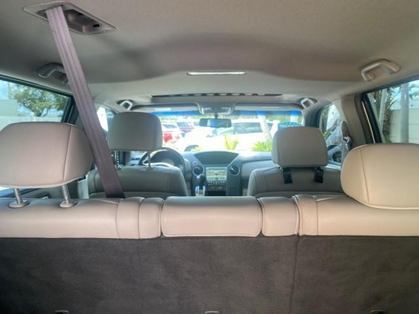 2011 Taffeta White /Gray Honda Pilot EX-L FL LOW MILES 93,295 (5FNYF3H58BB) with an 3.5L SOHC MPFI 24-Valve i-VTEC V6 Engine engine, Automatic transmission, located at 4701 North Dixie Hwy, Pompano Beach, FL, 33064, (954) 422-2889, 26.240938, -80.123474 - OUR WEBPAGE FLORIDACARS1.COM HAS OVER 100 PHOTOS AND FREE CARFAX LINK 2011 HONDA PILOT EX-L VIN: 5FNYF3H58BB048398 5 F N Y F 3 H 5 8 B B 0 4 8 3 9 8 4 DOOR WAGON/SPORT UTILITY 3.5L V6 F SOHC 24V GASOLINE FRONT WHEEL DRIVE Features ABS Brakes Air Conditioning Alloy Wheels AM/FM Stereo Automatic Trans - Photo#97