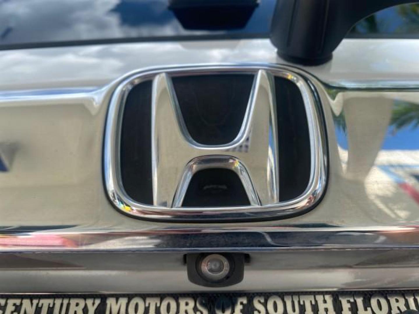 2011 Taffeta White /Gray Honda Pilot EX-L FL LOW MILES 93,295 (5FNYF3H58BB) with an 3.5L SOHC MPFI 24-Valve i-VTEC V6 Engine engine, Automatic transmission, located at 4701 North Dixie Hwy, Pompano Beach, FL, 33064, (954) 422-2889, 26.240938, -80.123474 - OUR WEBPAGE FLORIDACARS1.COM HAS OVER 100 PHOTOS AND FREE CARFAX LINK 2011 HONDA PILOT EX-L VIN: 5FNYF3H58BB048398 5 F N Y F 3 H 5 8 B B 0 4 8 3 9 8 4 DOOR WAGON/SPORT UTILITY 3.5L V6 F SOHC 24V GASOLINE FRONT WHEEL DRIVE Features ABS Brakes Air Conditioning Alloy Wheels AM/FM Stereo Automatic Trans - Photo#98