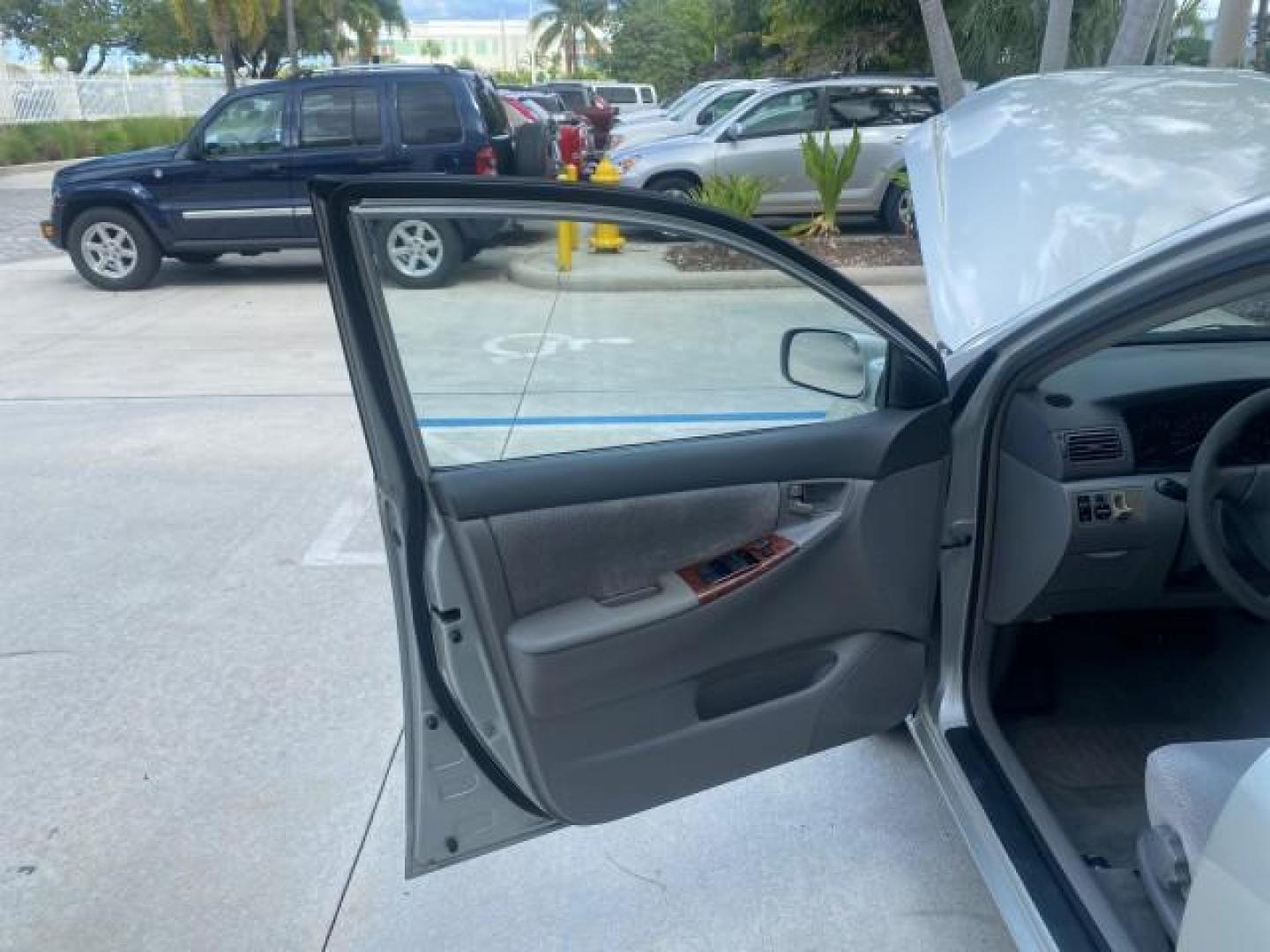 2004 Lunar Mist Metallic /Light Gray Toyota Corolla LE LOW MILES 47,436 (2T1BR38E04C) with an 1.8L DOHC EFI 16-Valve 4-Cyl Aluminum Engine engine, Automatic transmission, located at 4701 North Dixie Hwy, Pompano Beach, FL, 33064, (954) 422-2889, 26.240938, -80.123474 - OUR WEBPAGE FLORIDACARS1.COM HAS OVER 100 PHOTOS AND FREE CARFAX LINK 2004 TOYOTA COROLLA CE VIN: 2T1BR38E04C236689 2 T 1 B R 3 8 E 0 4 C 2 3 6 6 8 9 SEDAN 4 DR 1.8L I4 F DOHC 16V GASOLINE FRONT WHEEL DRIVE Features ABS Brakes Air Conditioning AM/FM Stereo Automatic Transmission CD Audio Cloth Seats - Photo#9