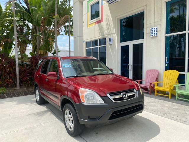 2003 Chianti Red Pearl /Saddle Honda CR-V EX 4WD NICE CLEAN SUNROOF (JHLRD78843C) with an 2.4L DOHC i-VTEC 16-Valve I4 Engine engine, Automatic transmission, located at 4701 North Dixie Hwy, Pompano Beach, FL, 33064, (954) 422-2889, 26.240938, -80.123474 - OUR WEBPAGE FLORIDACARS1.COM HAS OVER 100 PHOTOS AND FREE CARFAX LINK 2003 HONDA CR-V EX VIN: JHLRD78843C024323 J H L R D 7 8 8 4 3 C 0 2 4 3 2 3 4 DOOR WAGON/SPORT UTILITY 2.4L I4 F DOHC GASOLINE ALL WHEEL DRIVE Basic Features ABS Brakes AM/FM Stereo Air Conditioning Automatic Transmission Sunroof - Photo#1