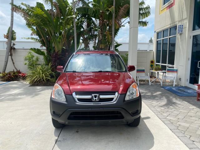 2003 Chianti Red Pearl /Saddle Honda CR-V EX 4WD NICE CLEAN SUNROOF (JHLRD78843C) with an 2.4L DOHC i-VTEC 16-Valve I4 Engine engine, Automatic transmission, located at 4701 North Dixie Hwy, Pompano Beach, FL, 33064, (954) 422-2889, 26.240938, -80.123474 - OUR WEBPAGE FLORIDACARS1.COM HAS OVER 100 PHOTOS AND FREE CARFAX LINK 2003 HONDA CR-V EX VIN: JHLRD78843C024323 J H L R D 7 8 8 4 3 C 0 2 4 3 2 3 4 DOOR WAGON/SPORT UTILITY 2.4L I4 F DOHC GASOLINE ALL WHEEL DRIVE Basic Features ABS Brakes AM/FM Stereo Air Conditioning Automatic Transmission Sunroof - Photo#2