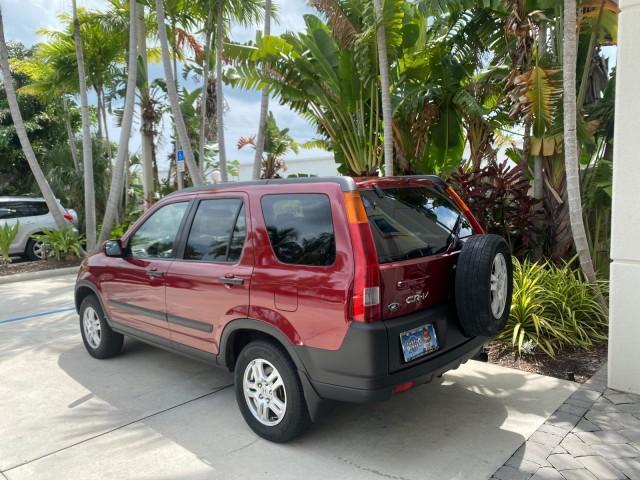 2003 Chianti Red Pearl /Saddle Honda CR-V EX 4WD NICE CLEAN SUNROOF (JHLRD78843C) with an 2.4L DOHC i-VTEC 16-Valve I4 Engine engine, Automatic transmission, located at 4701 North Dixie Hwy, Pompano Beach, FL, 33064, (954) 422-2889, 26.240938, -80.123474 - OUR WEBPAGE FLORIDACARS1.COM HAS OVER 100 PHOTOS AND FREE CARFAX LINK 2003 HONDA CR-V EX VIN: JHLRD78843C024323 J H L R D 7 8 8 4 3 C 0 2 4 3 2 3 4 DOOR WAGON/SPORT UTILITY 2.4L I4 F DOHC GASOLINE ALL WHEEL DRIVE Basic Features ABS Brakes AM/FM Stereo Air Conditioning Automatic Transmission Sunroof - Photo#5