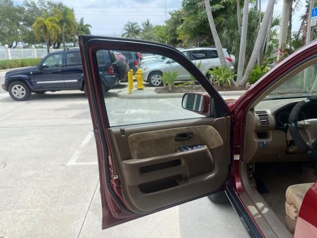 2003 Chianti Red Pearl /Saddle Honda CR-V EX 4WD NICE CLEAN SUNROOF (JHLRD78843C) with an 2.4L DOHC i-VTEC 16-Valve I4 Engine engine, Automatic transmission, located at 4701 North Dixie Hwy, Pompano Beach, FL, 33064, (954) 422-2889, 26.240938, -80.123474 - OUR WEBPAGE FLORIDACARS1.COM HAS OVER 100 PHOTOS AND FREE CARFAX LINK 2003 HONDA CR-V EX VIN: JHLRD78843C024323 J H L R D 7 8 8 4 3 C 0 2 4 3 2 3 4 DOOR WAGON/SPORT UTILITY 2.4L I4 F DOHC GASOLINE ALL WHEEL DRIVE Basic Features ABS Brakes AM/FM Stereo Air Conditioning Automatic Transmission Sunroof - Photo#9