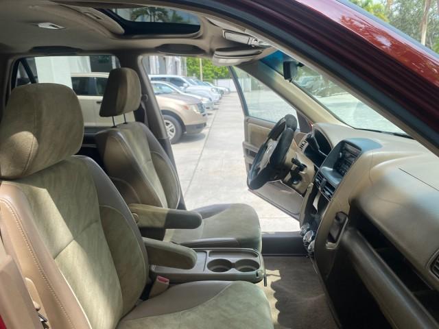 2003 Chianti Red Pearl /Saddle Honda CR-V EX 4WD NICE CLEAN SUNROOF (JHLRD78843C) with an 2.4L DOHC i-VTEC 16-Valve I4 Engine engine, Automatic transmission, located at 4701 North Dixie Hwy, Pompano Beach, FL, 33064, (954) 422-2889, 26.240938, -80.123474 - OUR WEBPAGE FLORIDACARS1.COM HAS OVER 100 PHOTOS AND FREE CARFAX LINK 2003 HONDA CR-V EX VIN: JHLRD78843C024323 J H L R D 7 8 8 4 3 C 0 2 4 3 2 3 4 DOOR WAGON/SPORT UTILITY 2.4L I4 F DOHC GASOLINE ALL WHEEL DRIVE Basic Features ABS Brakes AM/FM Stereo Air Conditioning Automatic Transmission Sunroof - Photo#12