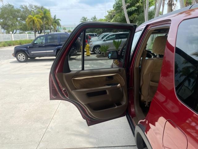 2003 Chianti Red Pearl /Saddle Honda CR-V EX 4WD NICE CLEAN SUNROOF (JHLRD78843C) with an 2.4L DOHC i-VTEC 16-Valve I4 Engine engine, Automatic transmission, located at 4701 North Dixie Hwy, Pompano Beach, FL, 33064, (954) 422-2889, 26.240938, -80.123474 - OUR WEBPAGE FLORIDACARS1.COM HAS OVER 100 PHOTOS AND FREE CARFAX LINK 2003 HONDA CR-V EX VIN: JHLRD78843C024323 J H L R D 7 8 8 4 3 C 0 2 4 3 2 3 4 DOOR WAGON/SPORT UTILITY 2.4L I4 F DOHC GASOLINE ALL WHEEL DRIVE Basic Features ABS Brakes AM/FM Stereo Air Conditioning Automatic Transmission Sunroof - Photo#13