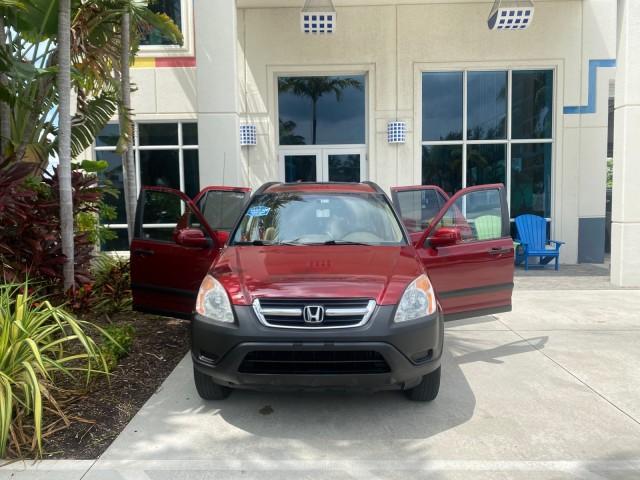 2003 Chianti Red Pearl /Saddle Honda CR-V EX 4WD NICE CLEAN SUNROOF (JHLRD78843C) with an 2.4L DOHC i-VTEC 16-Valve I4 Engine engine, Automatic transmission, located at 4701 North Dixie Hwy, Pompano Beach, FL, 33064, (954) 422-2889, 26.240938, -80.123474 - OUR WEBPAGE FLORIDACARS1.COM HAS OVER 100 PHOTOS AND FREE CARFAX LINK 2003 HONDA CR-V EX VIN: JHLRD78843C024323 J H L R D 7 8 8 4 3 C 0 2 4 3 2 3 4 DOOR WAGON/SPORT UTILITY 2.4L I4 F DOHC GASOLINE ALL WHEEL DRIVE Basic Features ABS Brakes AM/FM Stereo Air Conditioning Automatic Transmission Sunroof - Photo#16