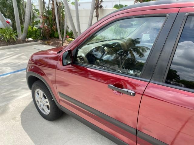 2003 Chianti Red Pearl /Saddle Honda CR-V EX 4WD NICE CLEAN SUNROOF (JHLRD78843C) with an 2.4L DOHC i-VTEC 16-Valve I4 Engine engine, Automatic transmission, located at 4701 North Dixie Hwy, Pompano Beach, FL, 33064, (954) 422-2889, 26.240938, -80.123474 - OUR WEBPAGE FLORIDACARS1.COM HAS OVER 100 PHOTOS AND FREE CARFAX LINK 2003 HONDA CR-V EX VIN: JHLRD78843C024323 J H L R D 7 8 8 4 3 C 0 2 4 3 2 3 4 DOOR WAGON/SPORT UTILITY 2.4L I4 F DOHC GASOLINE ALL WHEEL DRIVE Basic Features ABS Brakes AM/FM Stereo Air Conditioning Automatic Transmission Sunroof - Photo#26