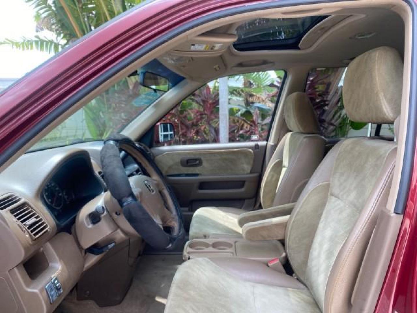 2003 Chianti Red Pearl /Saddle Honda CR-V EX 4WD NICE CLEAN SUNROOF (JHLRD78843C) with an 2.4L DOHC i-VTEC 16-Valve I4 Engine engine, Automatic transmission, located at 4701 North Dixie Hwy, Pompano Beach, FL, 33064, (954) 422-2889, 26.240938, -80.123474 - OUR WEBPAGE FLORIDACARS1.COM HAS OVER 100 PHOTOS AND FREE CARFAX LINK 2003 HONDA CR-V EX VIN: JHLRD78843C024323 J H L R D 7 8 8 4 3 C 0 2 4 3 2 3 4 DOOR WAGON/SPORT UTILITY 2.4L I4 F DOHC GASOLINE ALL WHEEL DRIVE Basic Features ABS Brakes AM/FM Stereo Air Conditioning Automatic Transmission Sunroof - Photo#33