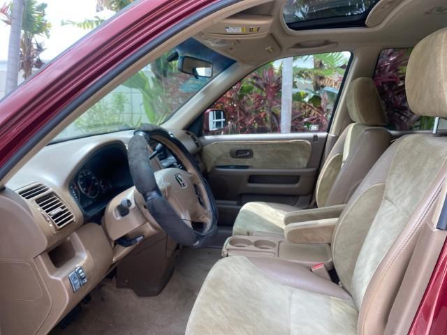 2003 Chianti Red Pearl /Saddle Honda CR-V EX 4WD NICE CLEAN SUNROOF (JHLRD78843C) with an 2.4L DOHC i-VTEC 16-Valve I4 Engine engine, Automatic transmission, located at 4701 North Dixie Hwy, Pompano Beach, FL, 33064, (954) 422-2889, 26.240938, -80.123474 - OUR WEBPAGE FLORIDACARS1.COM HAS OVER 100 PHOTOS AND FREE CARFAX LINK 2003 HONDA CR-V EX VIN: JHLRD78843C024323 J H L R D 7 8 8 4 3 C 0 2 4 3 2 3 4 DOOR WAGON/SPORT UTILITY 2.4L I4 F DOHC GASOLINE ALL WHEEL DRIVE Basic Features ABS Brakes AM/FM Stereo Air Conditioning Automatic Transmission Sunroof - Photo#34