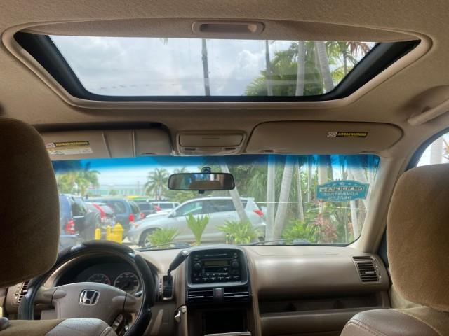 2003 Chianti Red Pearl /Saddle Honda CR-V EX 4WD NICE CLEAN SUNROOF (JHLRD78843C) with an 2.4L DOHC i-VTEC 16-Valve I4 Engine engine, Automatic transmission, located at 4701 North Dixie Hwy, Pompano Beach, FL, 33064, (954) 422-2889, 26.240938, -80.123474 - OUR WEBPAGE FLORIDACARS1.COM HAS OVER 100 PHOTOS AND FREE CARFAX LINK 2003 HONDA CR-V EX VIN: JHLRD78843C024323 J H L R D 7 8 8 4 3 C 0 2 4 3 2 3 4 DOOR WAGON/SPORT UTILITY 2.4L I4 F DOHC GASOLINE ALL WHEEL DRIVE Basic Features ABS Brakes AM/FM Stereo Air Conditioning Automatic Transmission Sunroof - Photo#73