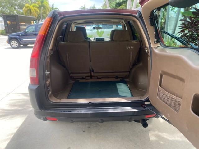 2003 Chianti Red Pearl /Saddle Honda CR-V EX 4WD NICE CLEAN SUNROOF (JHLRD78843C) with an 2.4L DOHC i-VTEC 16-Valve I4 Engine engine, Automatic transmission, located at 4701 North Dixie Hwy, Pompano Beach, FL, 33064, (954) 422-2889, 26.240938, -80.123474 - OUR WEBPAGE FLORIDACARS1.COM HAS OVER 100 PHOTOS AND FREE CARFAX LINK 2003 HONDA CR-V EX VIN: JHLRD78843C024323 J H L R D 7 8 8 4 3 C 0 2 4 3 2 3 4 DOOR WAGON/SPORT UTILITY 2.4L I4 F DOHC GASOLINE ALL WHEEL DRIVE Basic Features ABS Brakes AM/FM Stereo Air Conditioning Automatic Transmission Sunroof - Photo#86