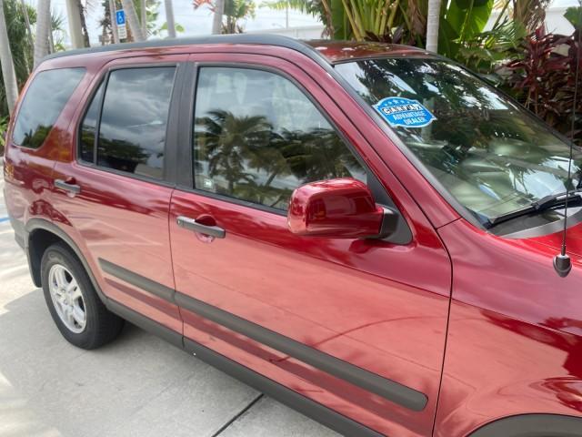 2003 Chianti Red Pearl /Saddle Honda CR-V EX 4WD NICE CLEAN SUNROOF (JHLRD78843C) with an 2.4L DOHC i-VTEC 16-Valve I4 Engine engine, Automatic transmission, located at 4701 North Dixie Hwy, Pompano Beach, FL, 33064, (954) 422-2889, 26.240938, -80.123474 - OUR WEBPAGE FLORIDACARS1.COM HAS OVER 100 PHOTOS AND FREE CARFAX LINK 2003 HONDA CR-V EX VIN: JHLRD78843C024323 J H L R D 7 8 8 4 3 C 0 2 4 3 2 3 4 DOOR WAGON/SPORT UTILITY 2.4L I4 F DOHC GASOLINE ALL WHEEL DRIVE Basic Features ABS Brakes AM/FM Stereo Air Conditioning Automatic Transmission Sunroof - Photo#93