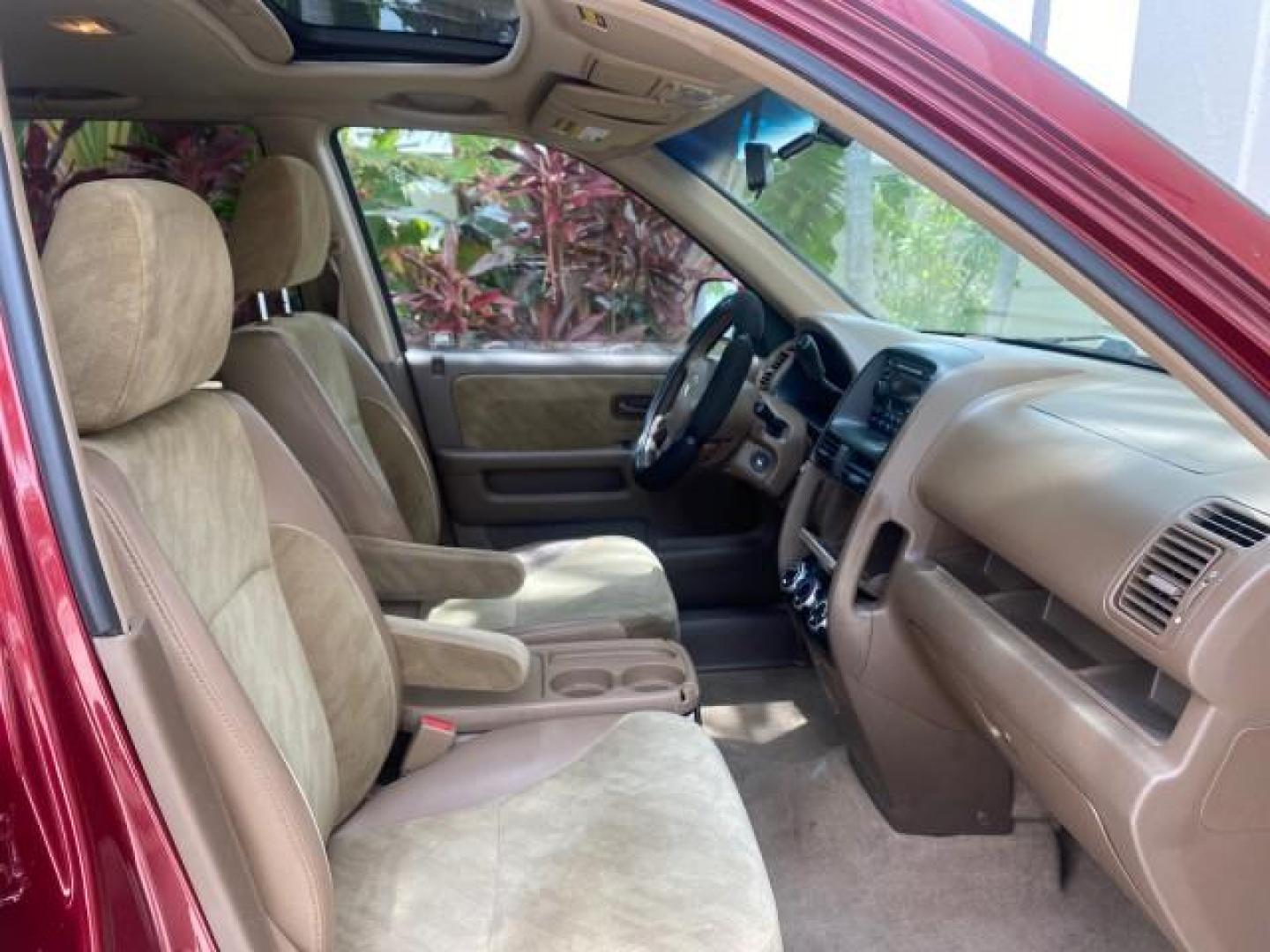 2003 Chianti Red Pearl /Saddle Honda CR-V EX 4WD NICE CLEAN SUNROOF (JHLRD78843C) with an 2.4L DOHC i-VTEC 16-Valve I4 Engine engine, Automatic transmission, located at 4701 North Dixie Hwy, Pompano Beach, FL, 33064, (954) 422-2889, 26.240938, -80.123474 - OUR WEBPAGE FLORIDACARS1.COM HAS OVER 100 PHOTOS AND FREE CARFAX LINK 2003 HONDA CR-V EX VIN: JHLRD78843C024323 J H L R D 7 8 8 4 3 C 0 2 4 3 2 3 4 DOOR WAGON/SPORT UTILITY 2.4L I4 F DOHC GASOLINE ALL WHEEL DRIVE Basic Features ABS Brakes AM/FM Stereo Air Conditioning Automatic Transmission Sunroof - Photo#98