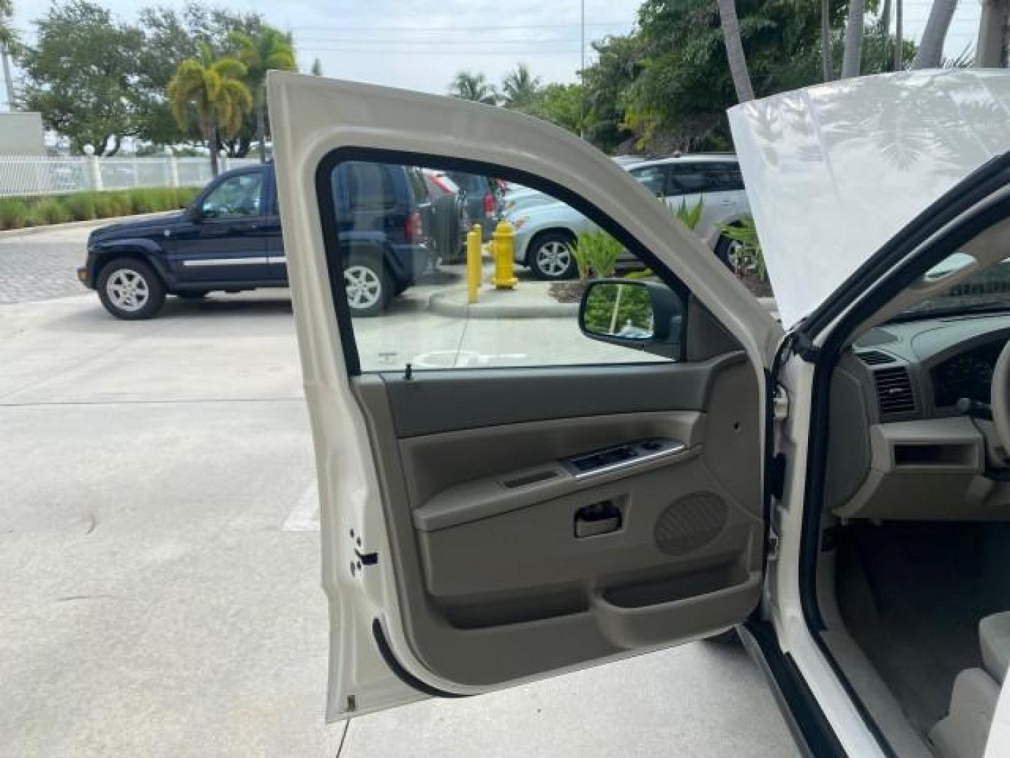 2005 Stone White /Medium Slate Gray Jeep Grand Cherokee Laredo LOW MILES 61,347 (1J4GS48K85C) with an 3.7L V6 Power Tech Engine engine, Automatic transmission, located at 4701 North Dixie Hwy, Pompano Beach, FL, 33064, (954) 422-2889, 26.240938, -80.123474 - OUR WEBPAGE FLORIDACARS1.COM HAS OVER 100 PHOTOS AND FREE CARFAX LINK 2005 JEEP GRAND CHEROKEE LAREDO VIN: 1J4GS48K85C634226 1 J 4 G S 4 8 K 8 5 C 6 3 4 2 2 6 4 DOOR WAGON/SPORT UTILITY 3.7L V6 F GASOLINE REAR WHEEL DRIVE Features ABS Brakes Air Conditioning Alloy Wheels AM/FM Stereo Automatic Trans - Photo#9