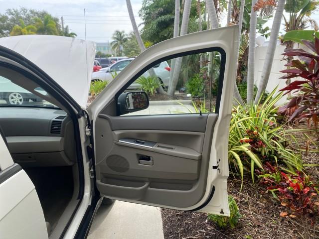2005 Stone White /Medium Slate Gray Jeep Grand Cherokee Laredo LOW MILES 61,351 (1J4GS48K85C) with an 3.7L V6 Power Tech Engine engine, Automatic transmission, located at 4701 North Dixie Hwy, Pompano Beach, FL, 33064, (954) 422-2889, 26.240938, -80.123474 - OUR WEBPAGE FLORIDACARS1.COM HAS OVER 100 PHOTOS AND FREE CARFAX LINK 2005 JEEP GRAND CHEROKEE LAREDO VIN: 1J4GS48K85C634226 1 J 4 G S 4 8 K 8 5 C 6 3 4 2 2 6 4 DOOR WAGON/SPORT UTILITY 3.7L V6 F GASOLINE REAR WHEEL DRIVE Features ABS Brakes Air Conditioning Alloy Wheels AM/FM Stereo Automatic Trans - Photo#11