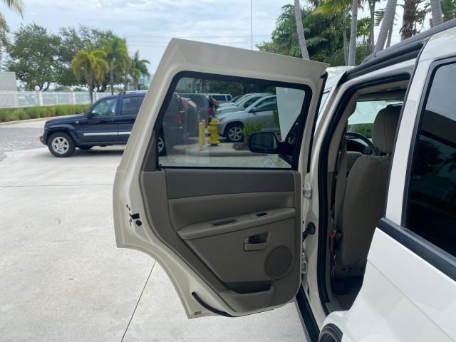 2005 Stone White /Medium Slate Gray Jeep Grand Cherokee Laredo LOW MILES 61,351 (1J4GS48K85C) with an 3.7L V6 Power Tech Engine engine, Automatic transmission, located at 4701 North Dixie Hwy, Pompano Beach, FL, 33064, (954) 422-2889, 26.240938, -80.123474 - OUR WEBPAGE FLORIDACARS1.COM HAS OVER 100 PHOTOS AND FREE CARFAX LINK 2005 JEEP GRAND CHEROKEE LAREDO VIN: 1J4GS48K85C634226 1 J 4 G S 4 8 K 8 5 C 6 3 4 2 2 6 4 DOOR WAGON/SPORT UTILITY 3.7L V6 F GASOLINE REAR WHEEL DRIVE Features ABS Brakes Air Conditioning Alloy Wheels AM/FM Stereo Automatic Trans - Photo#13